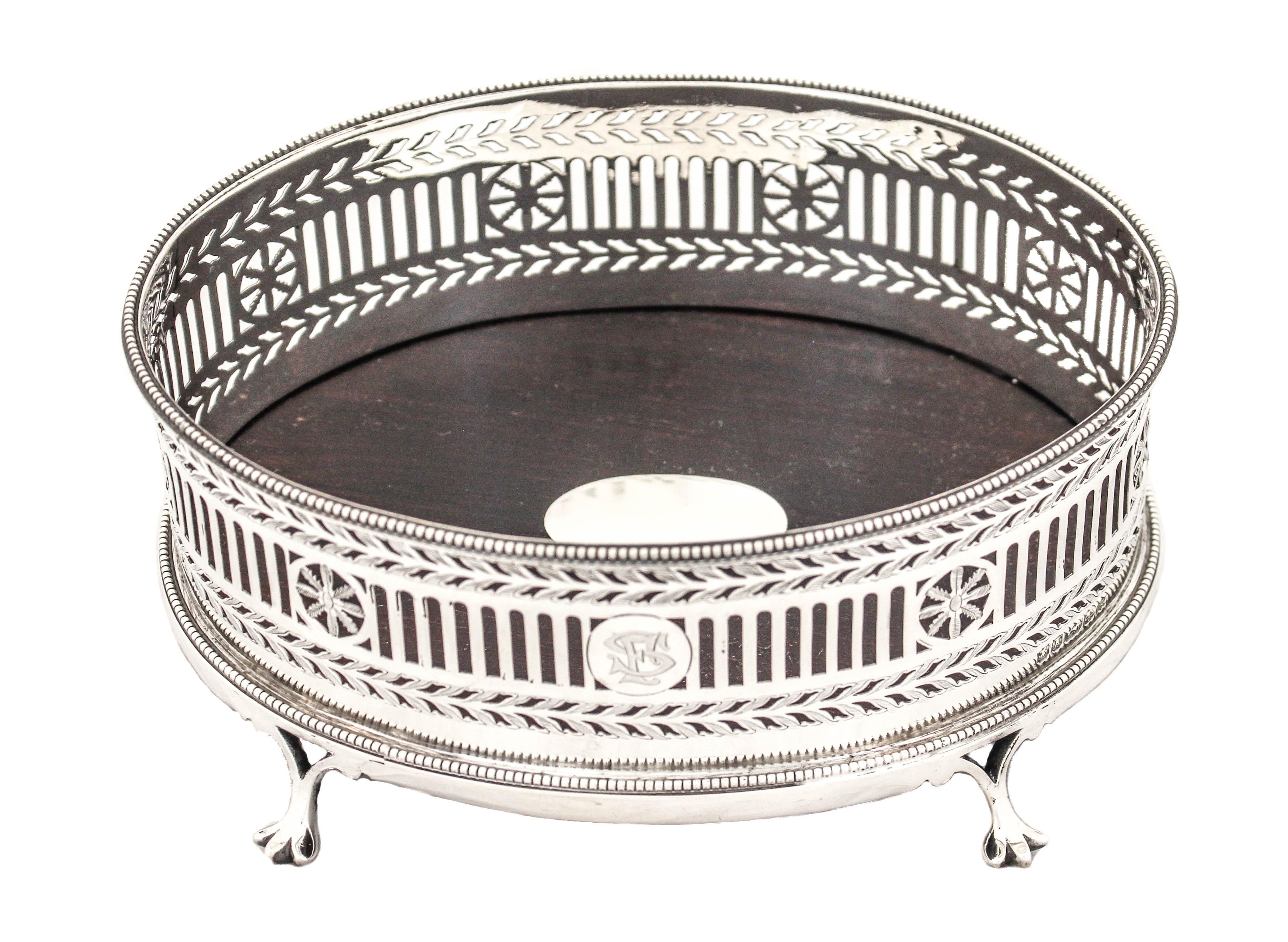 We are delighted to offer you this exceptional sterling silver (tea) tray, made by Harry Atkin (Atkin Brothers) of Sheffield England, hallmarked 1903.  This antique tray was manufactured during the reign of King Edward VII, successor to Queen