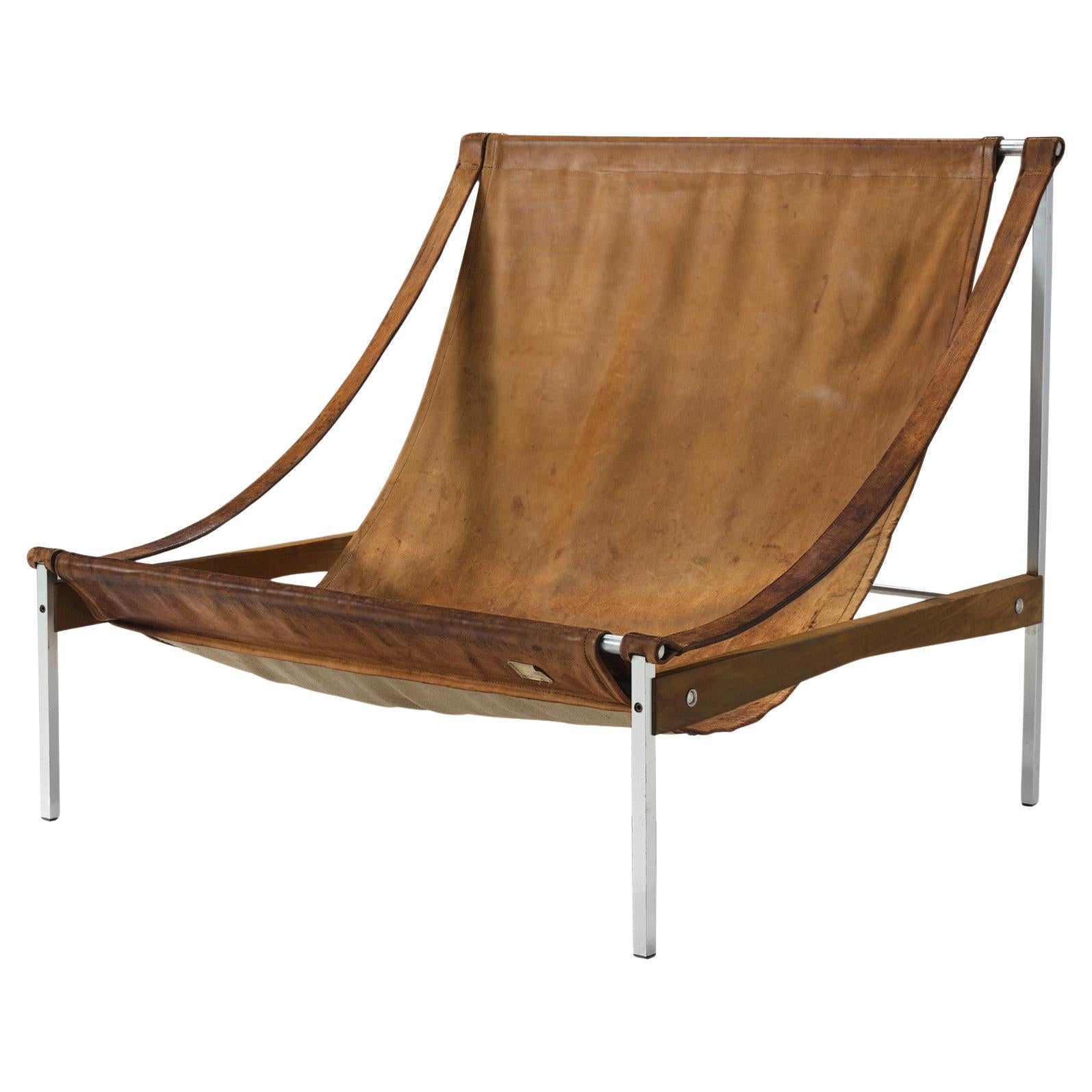 Rare Stig Poulsson 'Bequem' Lounge Chair in Brown Leather  For Sale