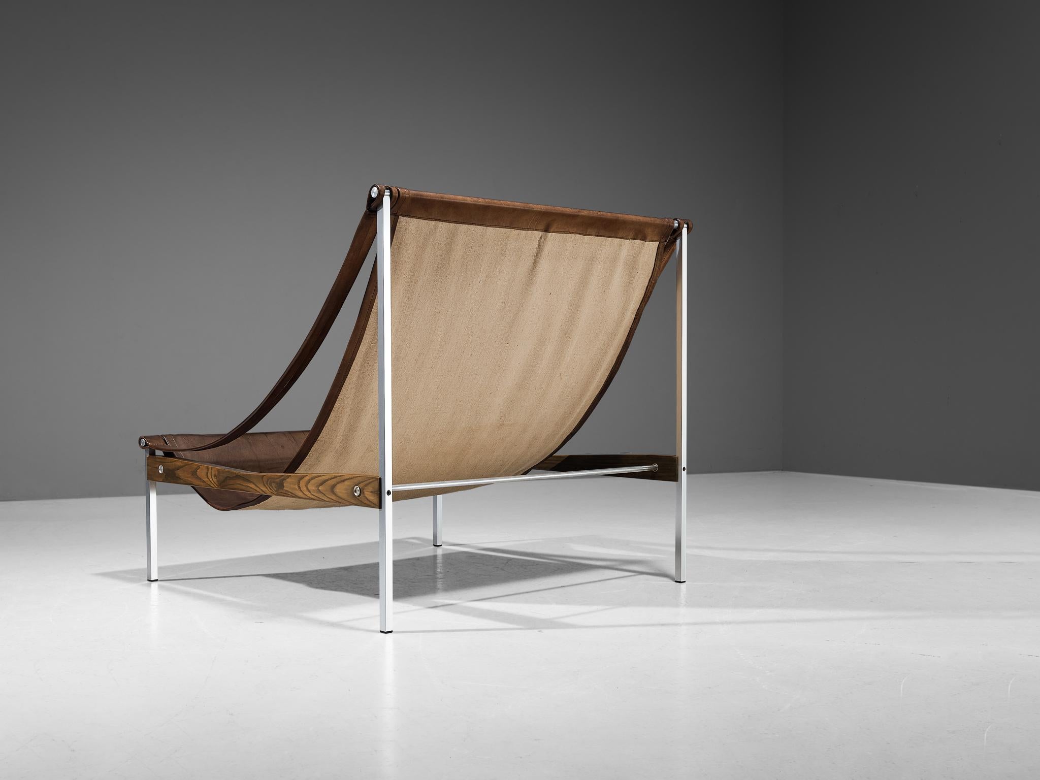 Scandinavian Modern Rare Stig Poulsson 'Bequem' Lounge Chair in Cognac Leather