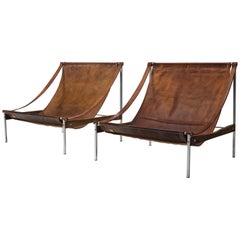 Rare Pair of Stig Poulsson 'Bequem' Lounge Chairs in Cognac Leather