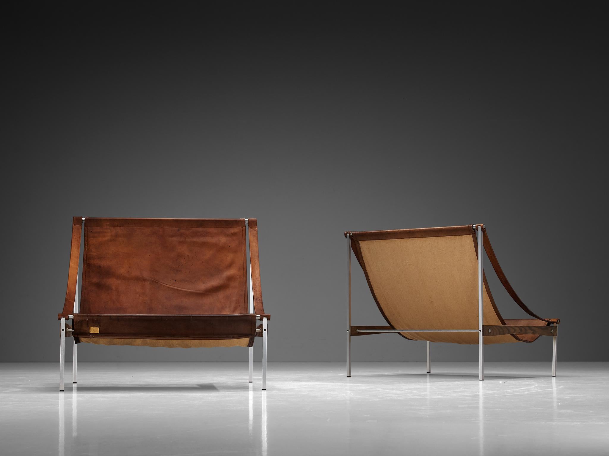 Aluminum Rare Stig Poulsson Pair of 'Bequem' Lounge Chairs in Brown Leather 