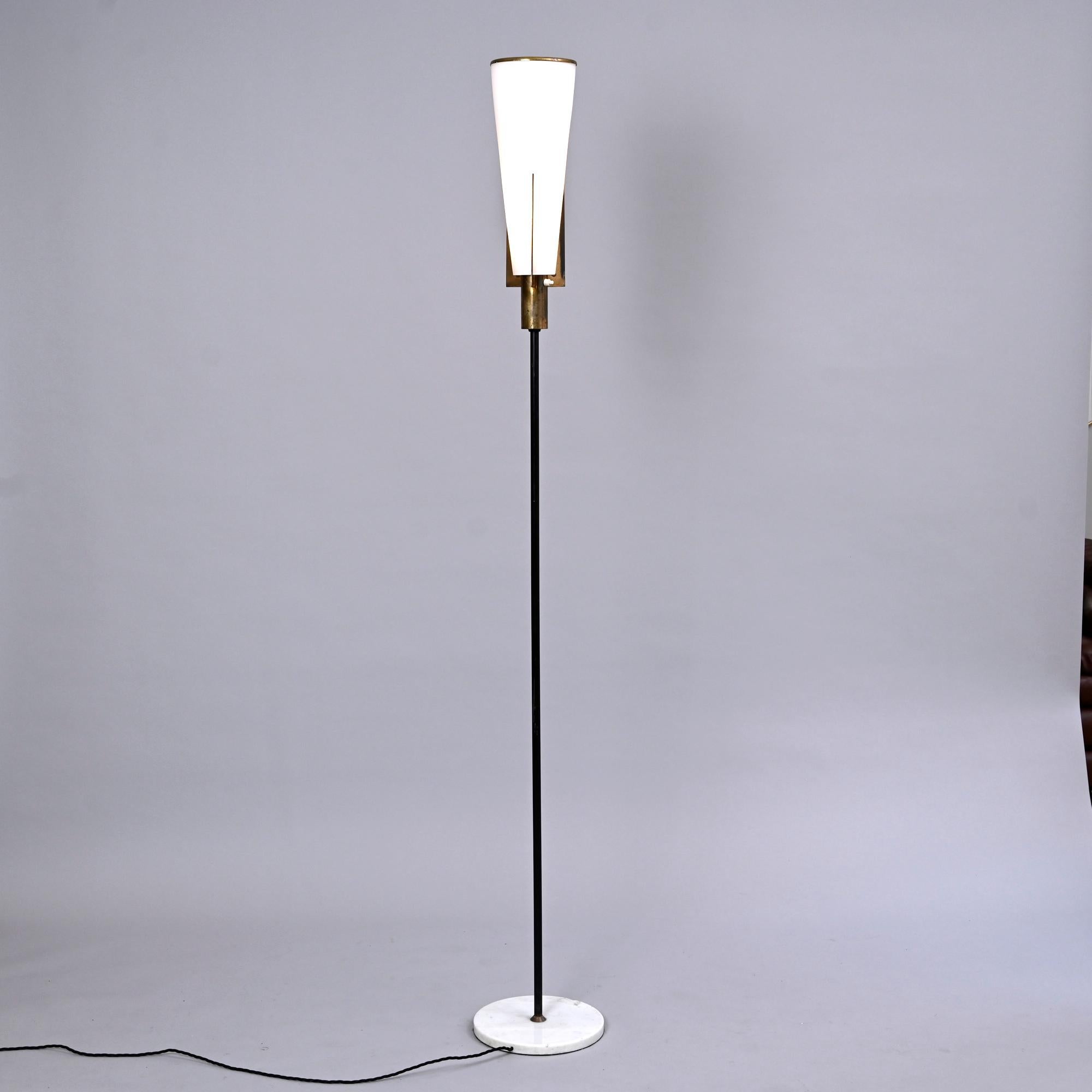 Very rare floor lamp version of the Stilnovo wall light. Model 2021/2

Original floor lamp. Brass has lovely patina. 

The lamp has been rewired and is structurally sound.