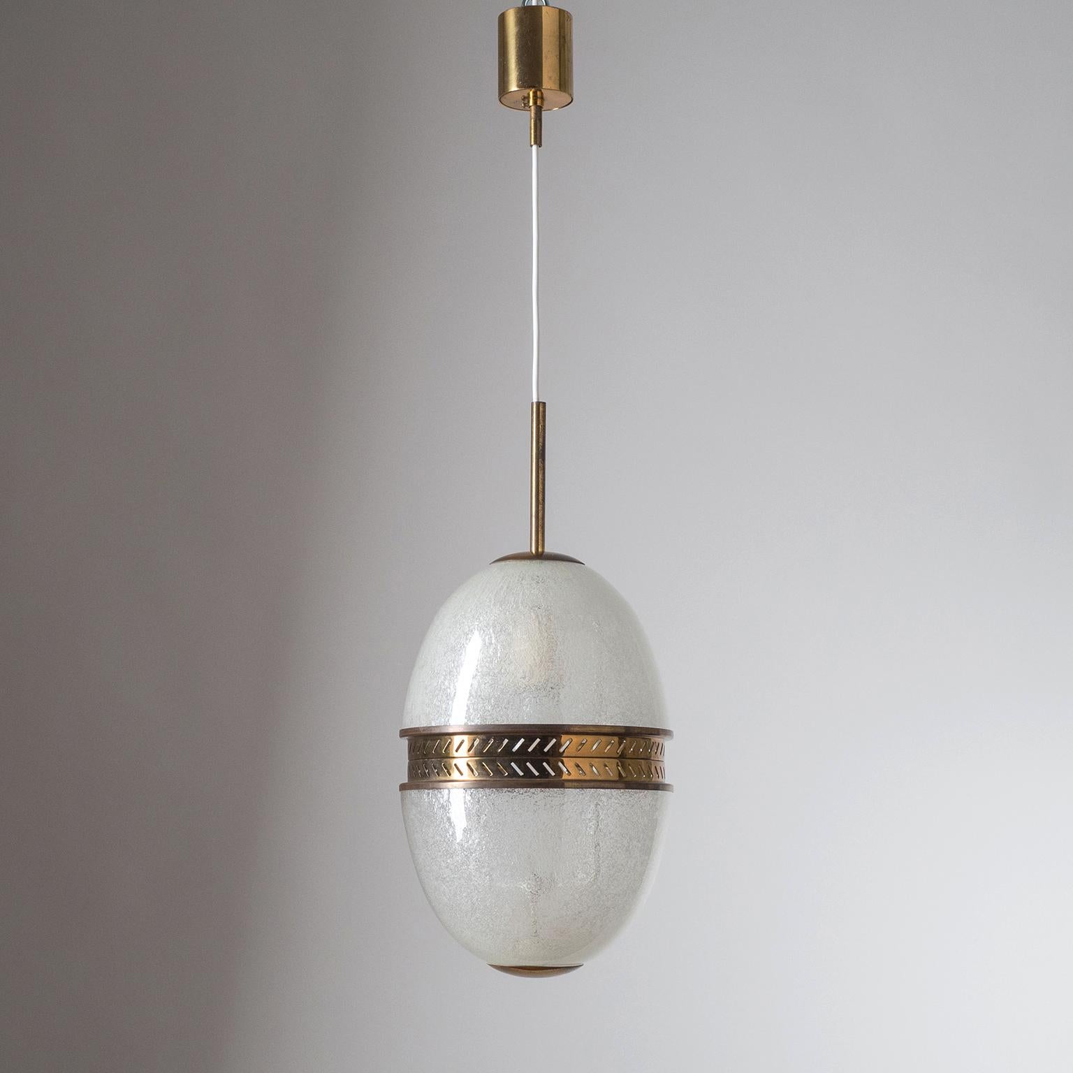 Rare Italian pendant attributed to Stilnovo, 1950s. Dual Murano glass diffuser in pulegoso technique. One original brass and ceramic E27 socket with new wiring. Height without cable 18inches/46cm (13inches/34cm without stem). Drop height adjustable