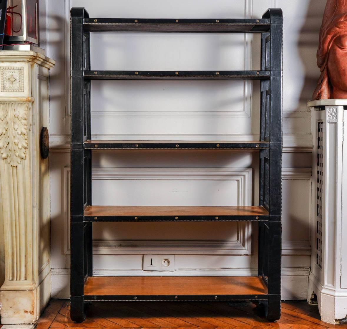 Black leather bookcase with oak shelves
perfect condition.