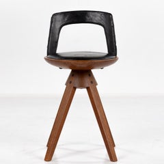 Rare swivel stool in teak and original black leather by Kindt-Larsen