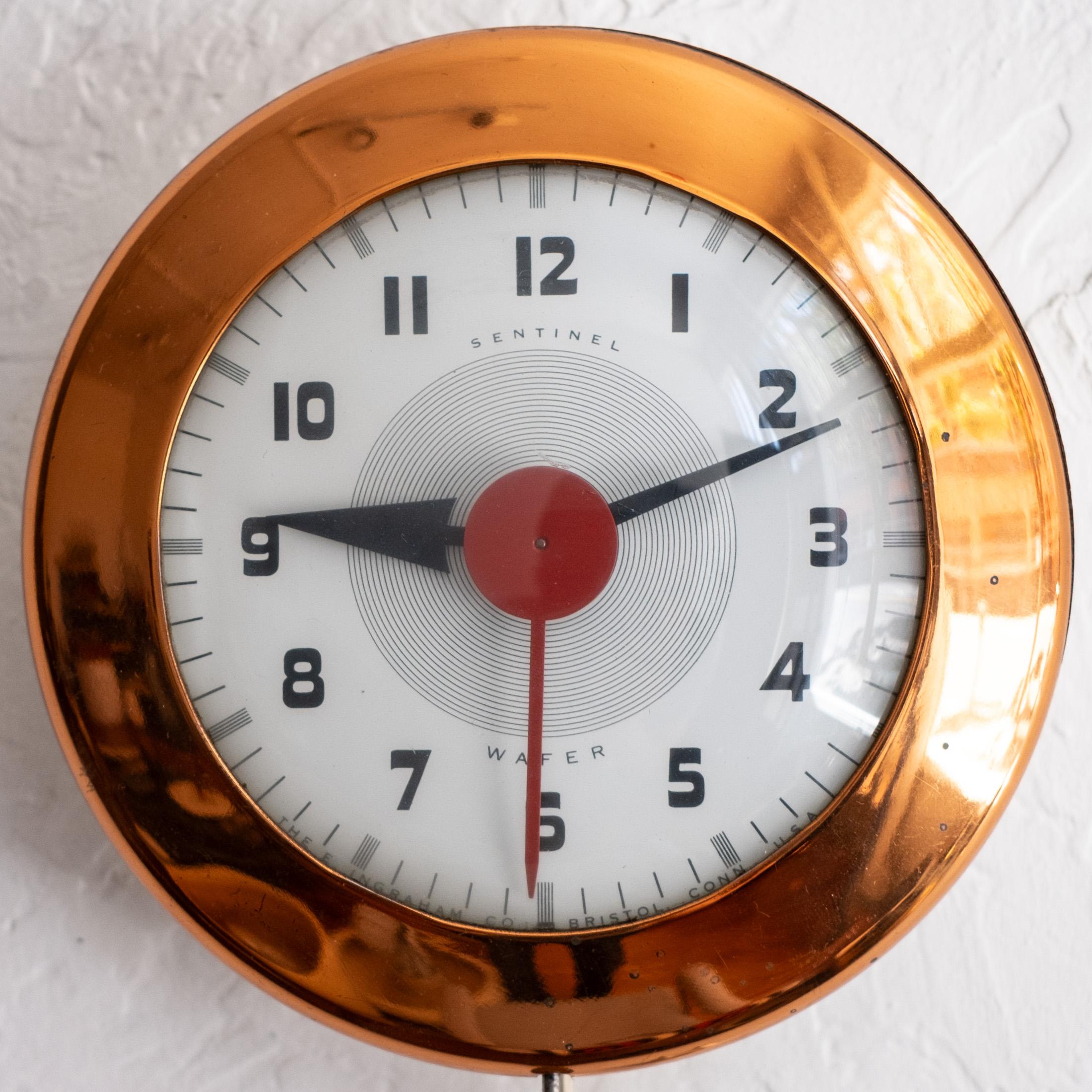 Henry Dreyfuss (American, 1904–1972) Wafer Clock, Model SK 174 by The E. Ingraham Co. Ultra rare in copper. USA, 1940
Dreyfus is one of the most important American Industrial Designers from the mid century. 

The clock runs as it should. 
