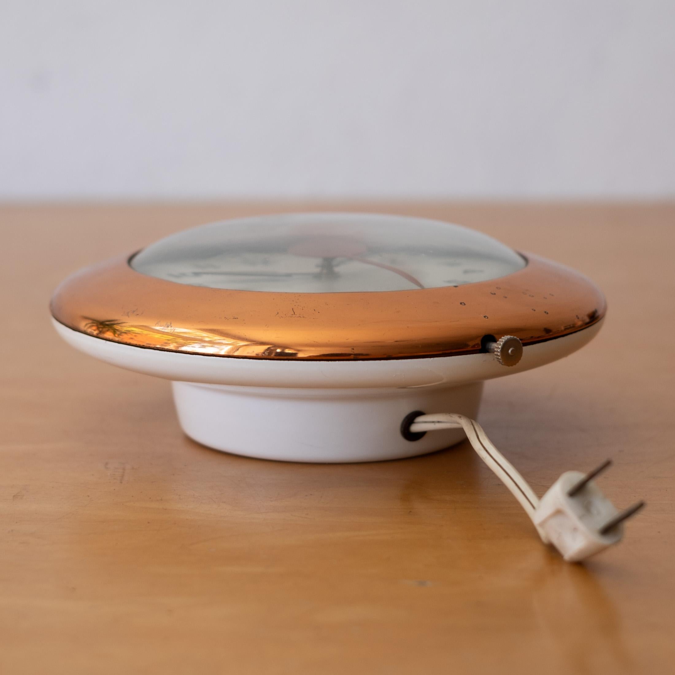 Rare Streamline Moderne Copper 1940s Wafer Wall Clock by Henry Dreyfuss In Good Condition For Sale In San Diego, CA