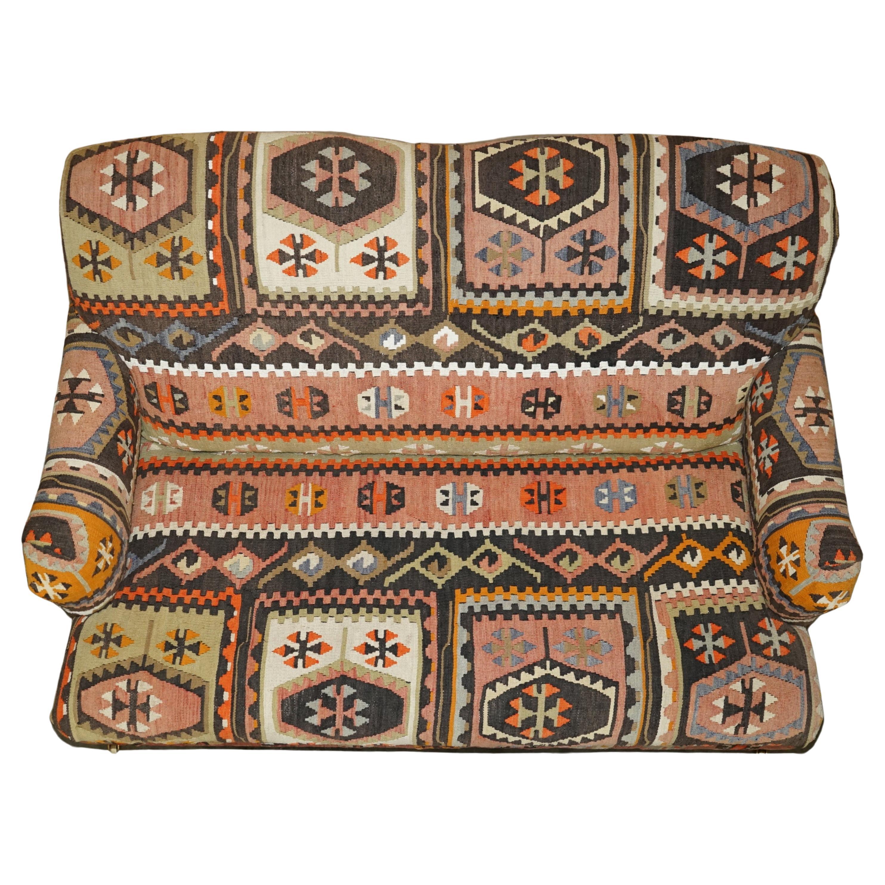 Royal House Antiques

Royal House Antiques is delighted to offer for sale this sublime original George Smith signature collection standard arm two-seat sofa upholstered with Aztec Kilims

Please note the delivery fee listed is just a guide, it