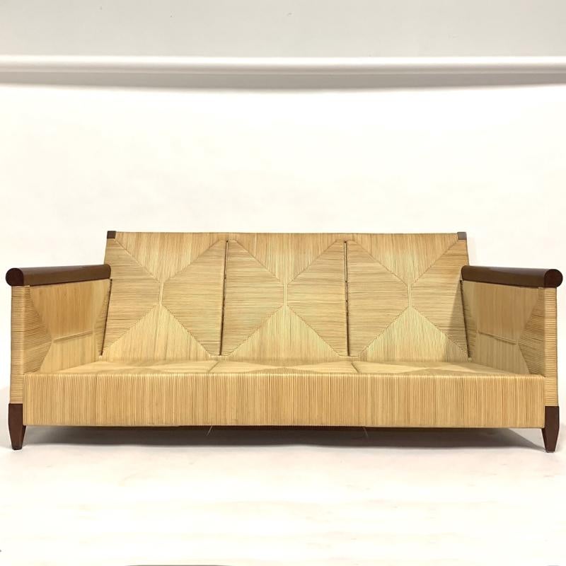 Absolutely stunning and very hard to find sofa designed by John Hutton for Donghia designs. From the Merbau collection. These Pieces are quite rare and demonstrate the talent for original design brought to Donghia by Hutton who was director from