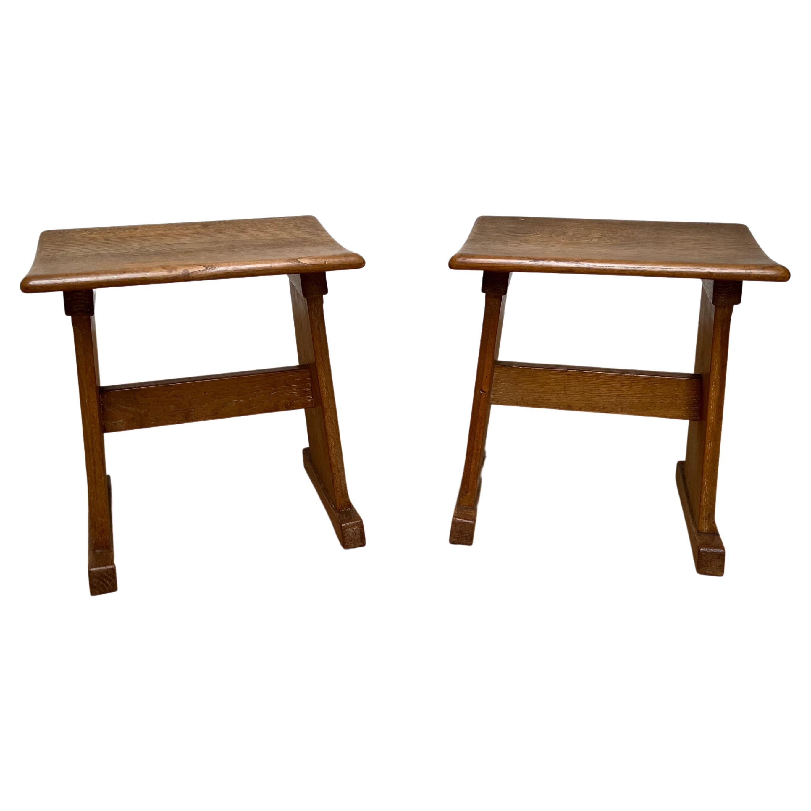 Great style and wonderful condition pair of semi-antique solid oak stools.

Finding this rare pair of vintage stools was a treat and to have found them in this amazing condition made this find even more rewarding. When you are looking for good and