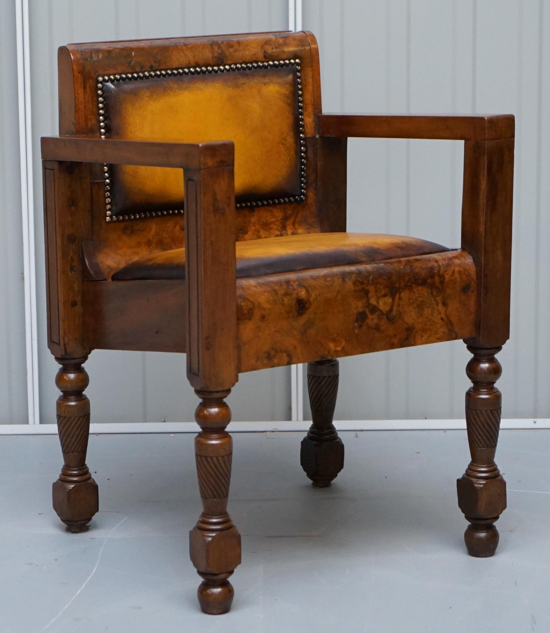 We are delighted to offer for sale this lovely fully restored handmade in England Art Deco burl walnut desk chair with brown leather upholstery

A very rare and comfortable armchair which has been fully restored. The restoration is as follows, the