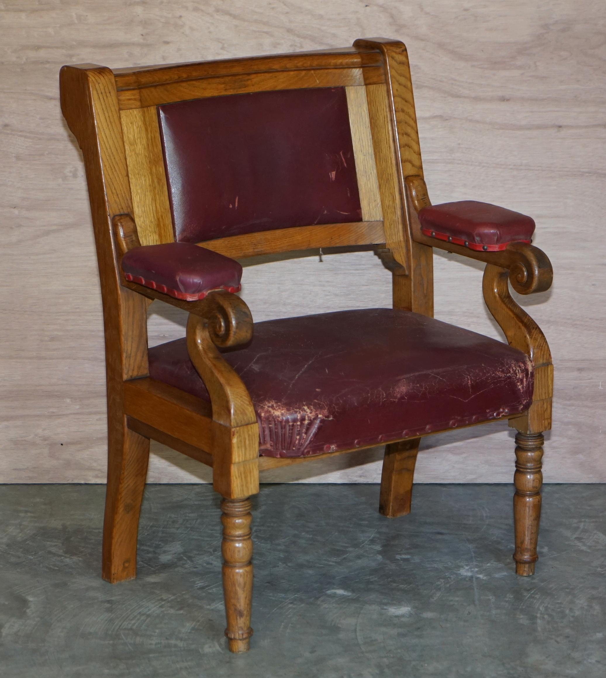We are delighted to offer this suite of six original Victorian antique oversized, distressed brown leather upholstery golden oak framed Freemason armchairs

These chairs are very impressive and important looking. They are made with golden oak