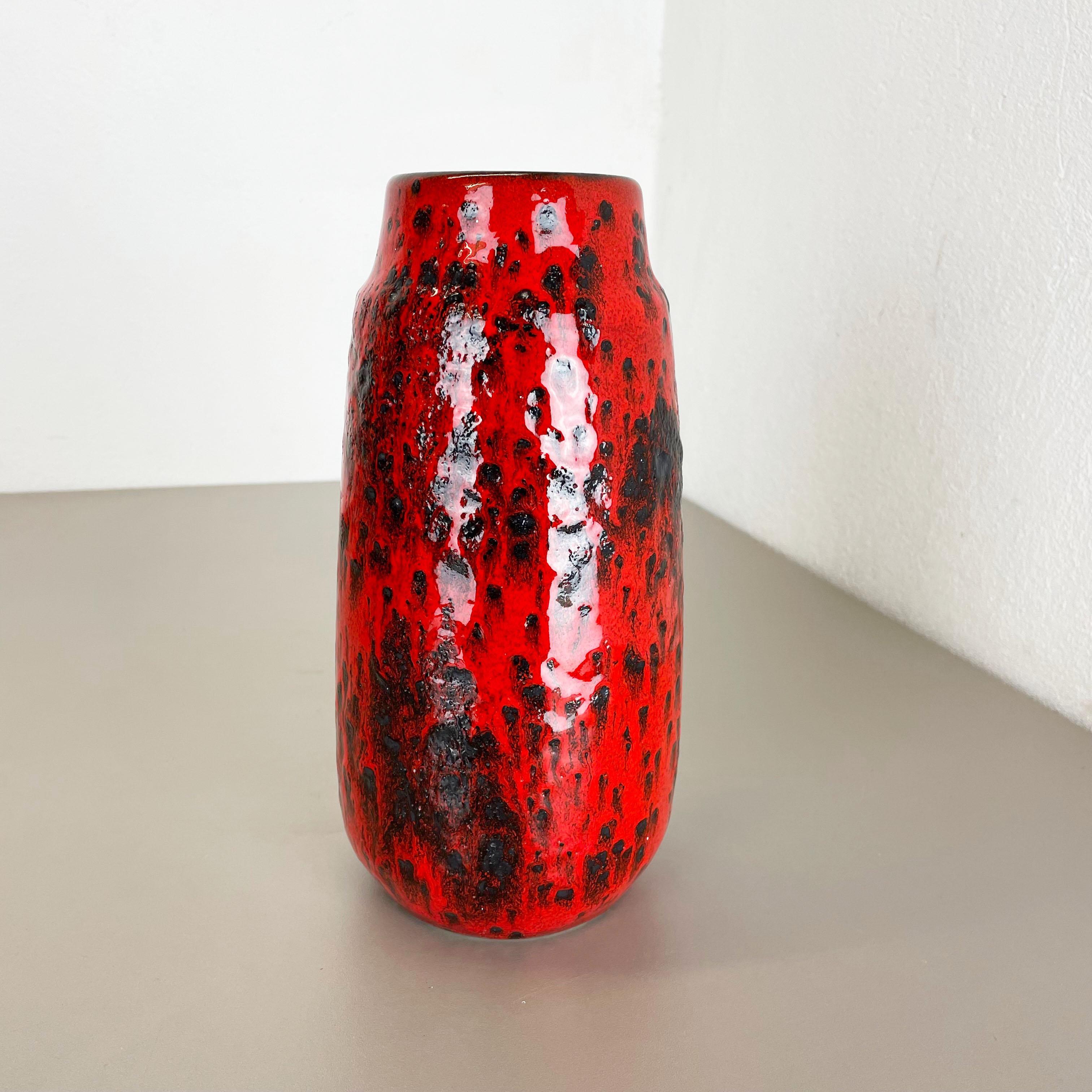 Article:

Fat lava art vase, heavy Brutalist glaze


Producer:

Scheurich, Germany



Decade:

1970s




This original vintage vase was produced in the 1970s in Germany. It is made of ceramic pottery in fat lava optic with abstract illustration in
