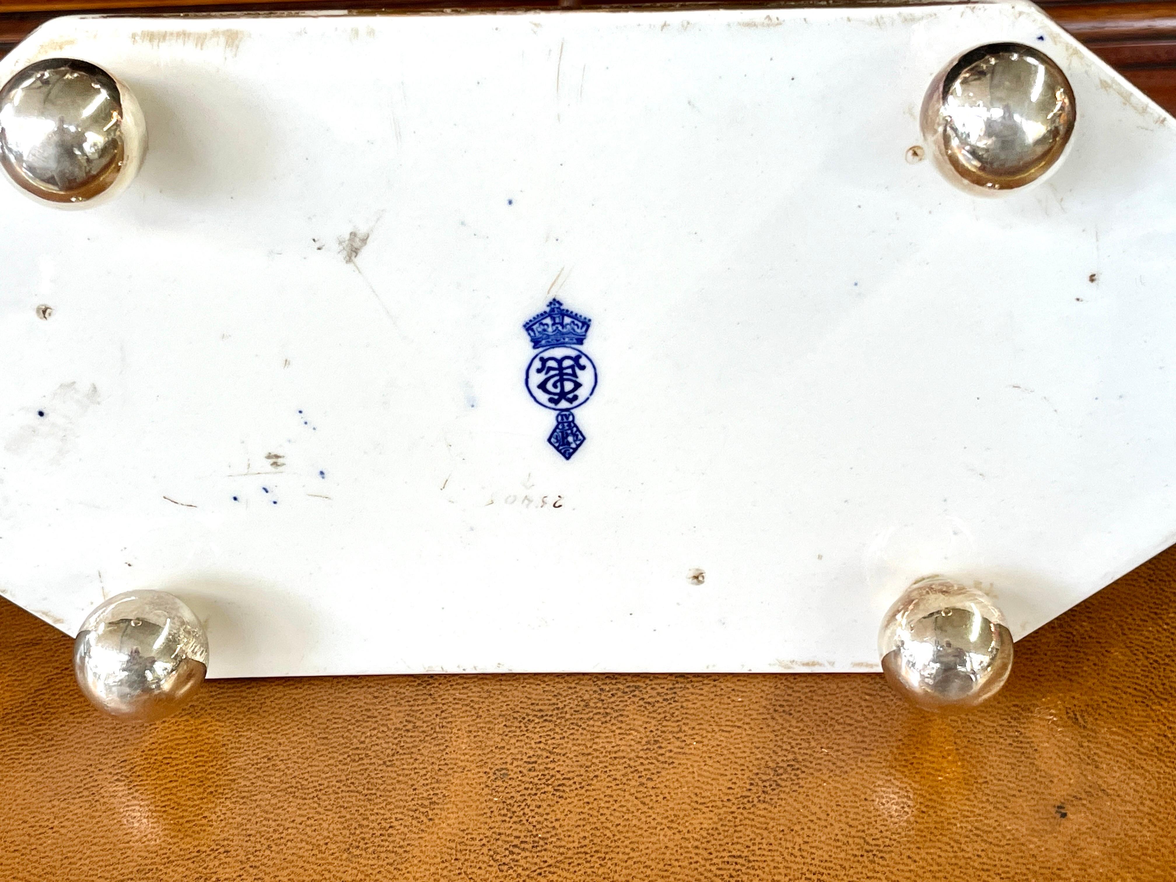 Extraordinarily rare and fine Antique English Sheffield silver plate and hand painted porcelain Toast or Letter Rack in the imari decor. The plating is in pristine, age-appropriate condition. Toast racks, typically in silver or silver plate, are a