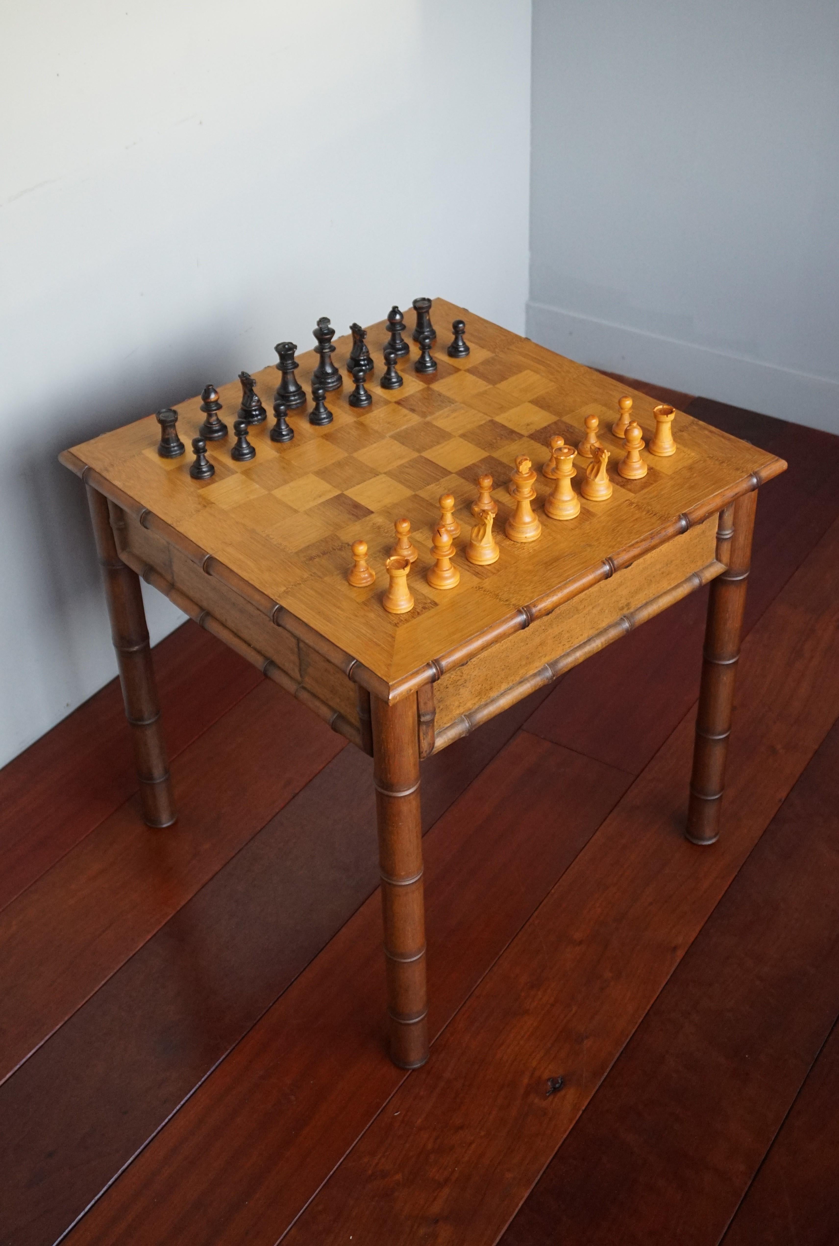 Rare and highly stylish chess table with a complete and hand carved wooden chess set.

Faux bamboo furniture has been circa since the 19th century and we have sold several pieces both at home and abroad. Most common are the wardrobes and chests of