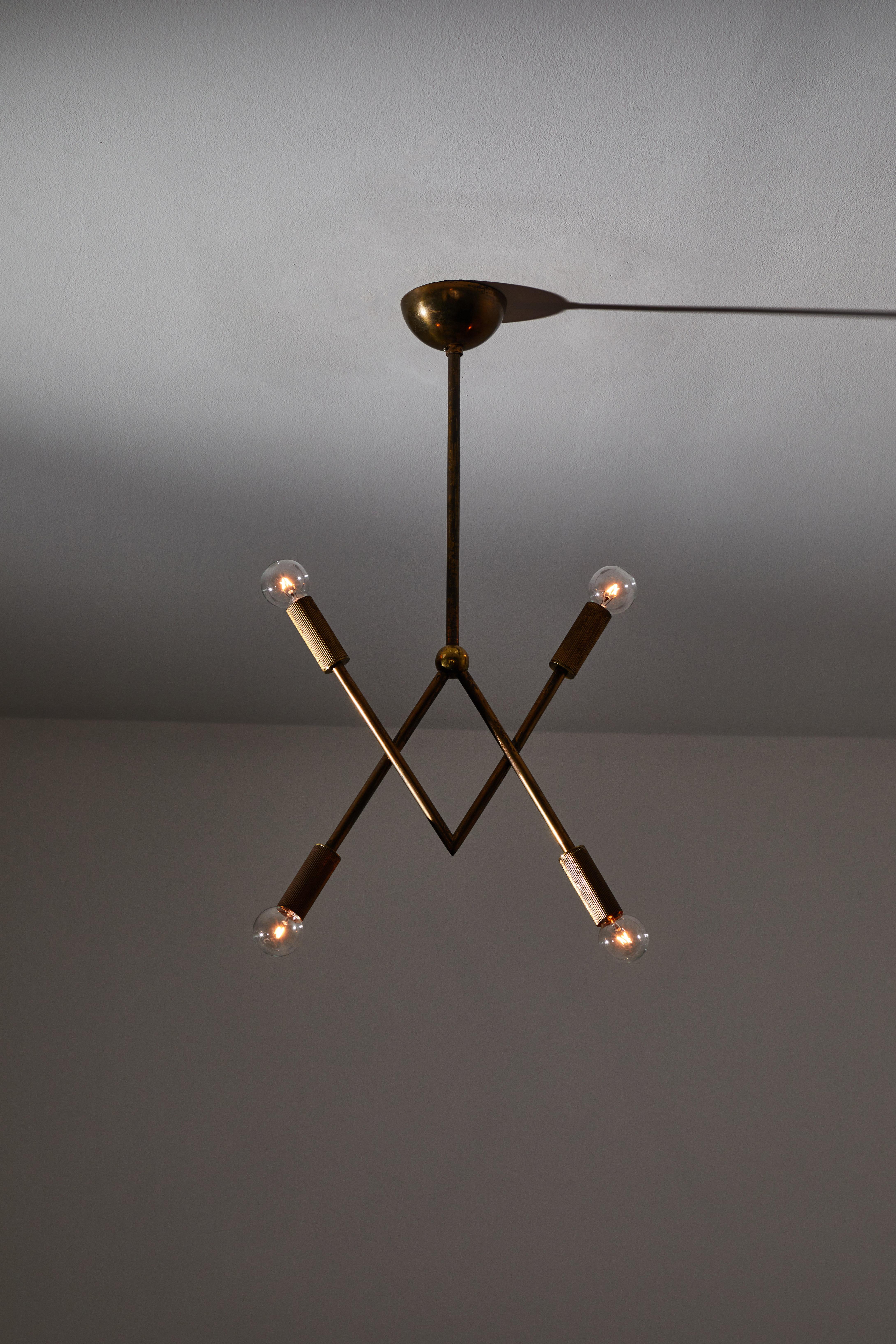 Rare suspension light by Guglielmo Ulrich. Designed in Italy, circa 1930s. Brass. Rewired for U.S. standards. Original canopy. We recommend four E27 candelabra 60w maximum bulbs. Bulbs provided as a one time courtesy.
