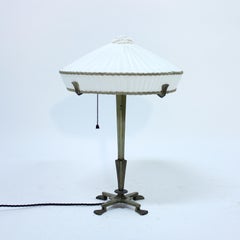 Rare Swedish brass table lamp by CG Hallberg, attributed to Elis Bergh, 1920s