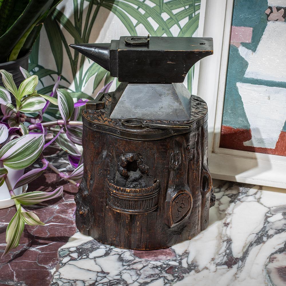 Cigar Cutter & Vesta Case

From our Black Forest collection, we are delighted to offer this very rare and unusual Swiss Black Forest carving of a tobacco jar shaped as a Blacksmiths Anvil complete with secret compartment and secret catch. The Black