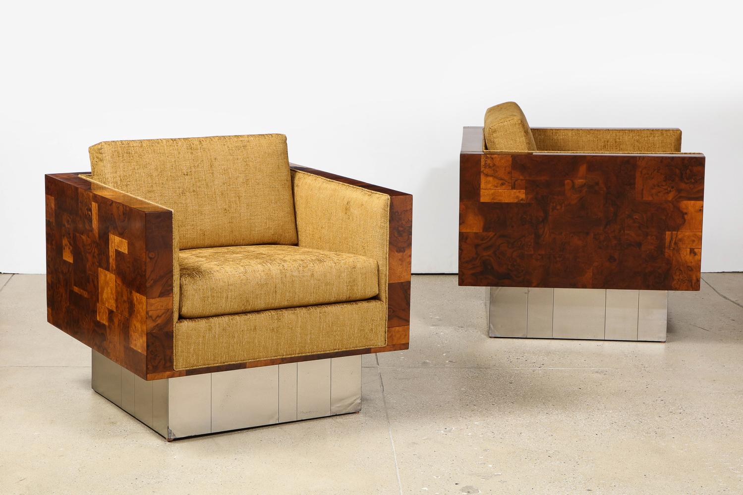 Burled wood, stainless steel, fabric, painted wood. A beautiful pair of Cityscape lounge chairs with a great swivel mechanism. Patch-work wood structure and velvet upholstery. Wood has been recently refinished, and cushions have been reupholstered.