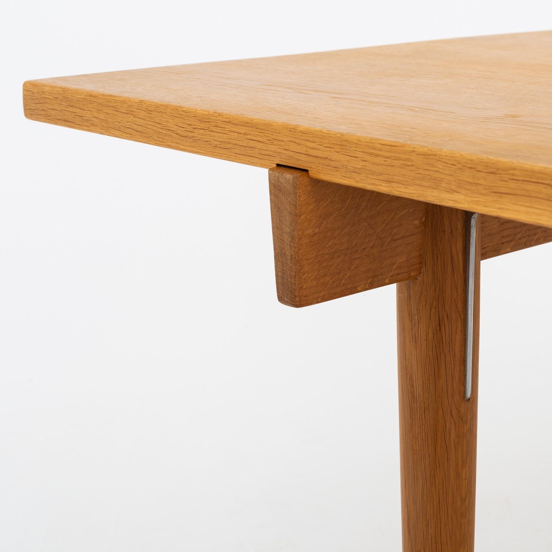 Dining table/work desk in oak and steel. Maker Johannes Hansen.