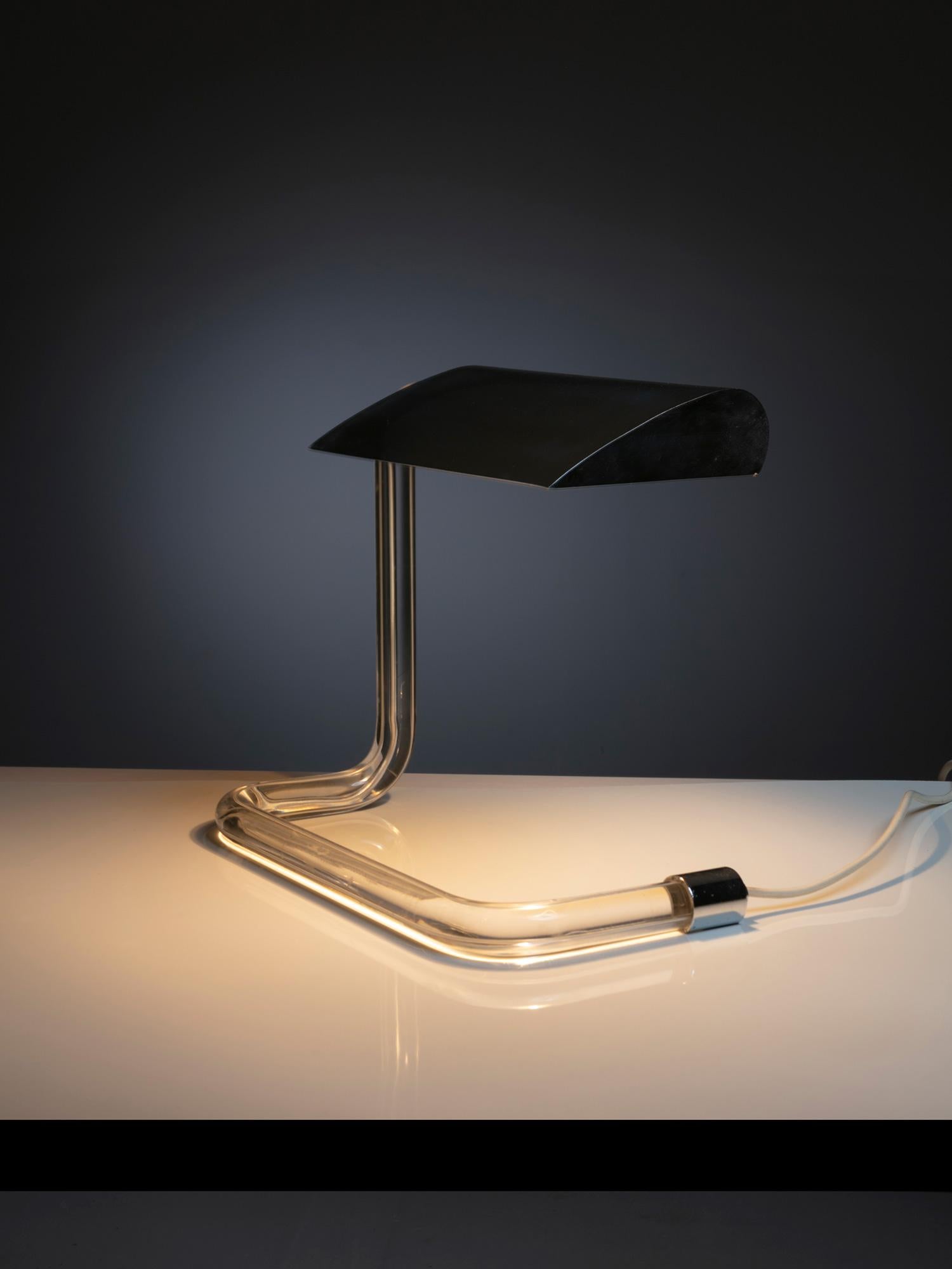 Crylicord series table lamp by Peter Hamburger for Knoll
Plexiglass curved body and sleek polished chrome shade.
