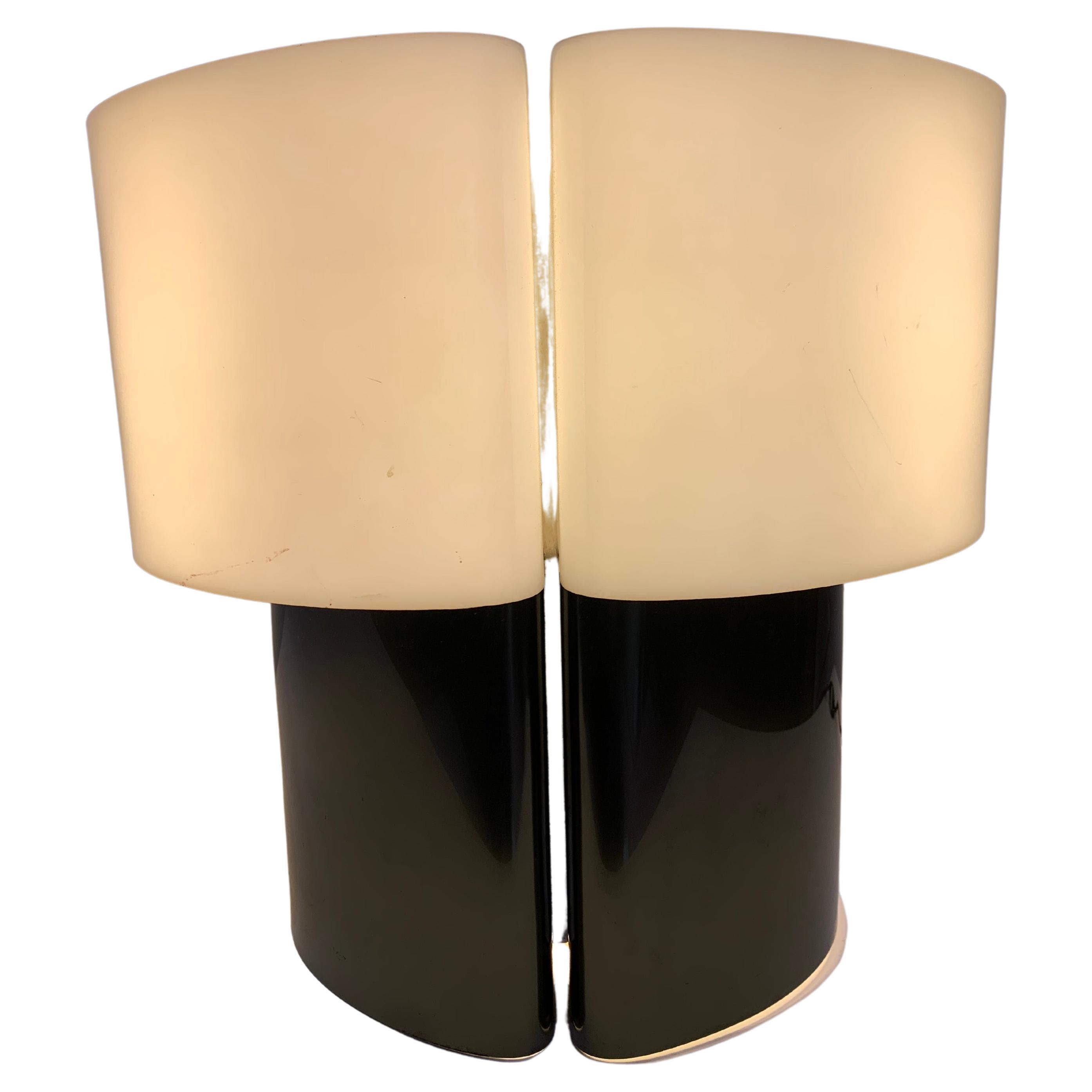 The rare “Cyclade” table lamps signed by danielle Quarante comes with a golden structure and a white shade in a shape of half-moon from both symmetrical sides made from PMMA.
Danielle Quarante is a French Postwar & Contemporary artist who was born