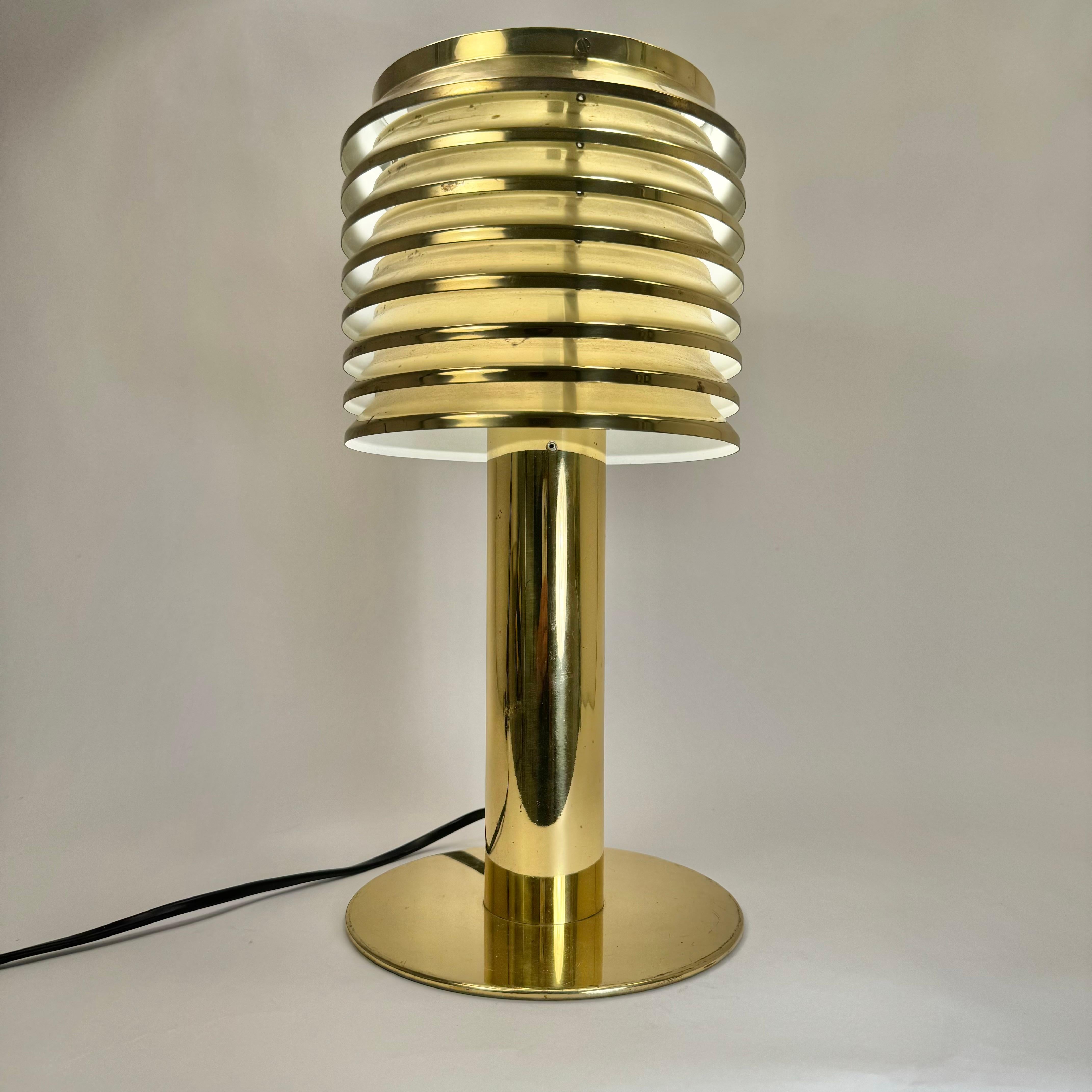 Rare Table Lamp Model B-142 Designed by Hans-Agne Jakobsson. Produced by Hans-Agne Jakobsson AB in Markaryd, Sweden

The top perforated plate is missing.
