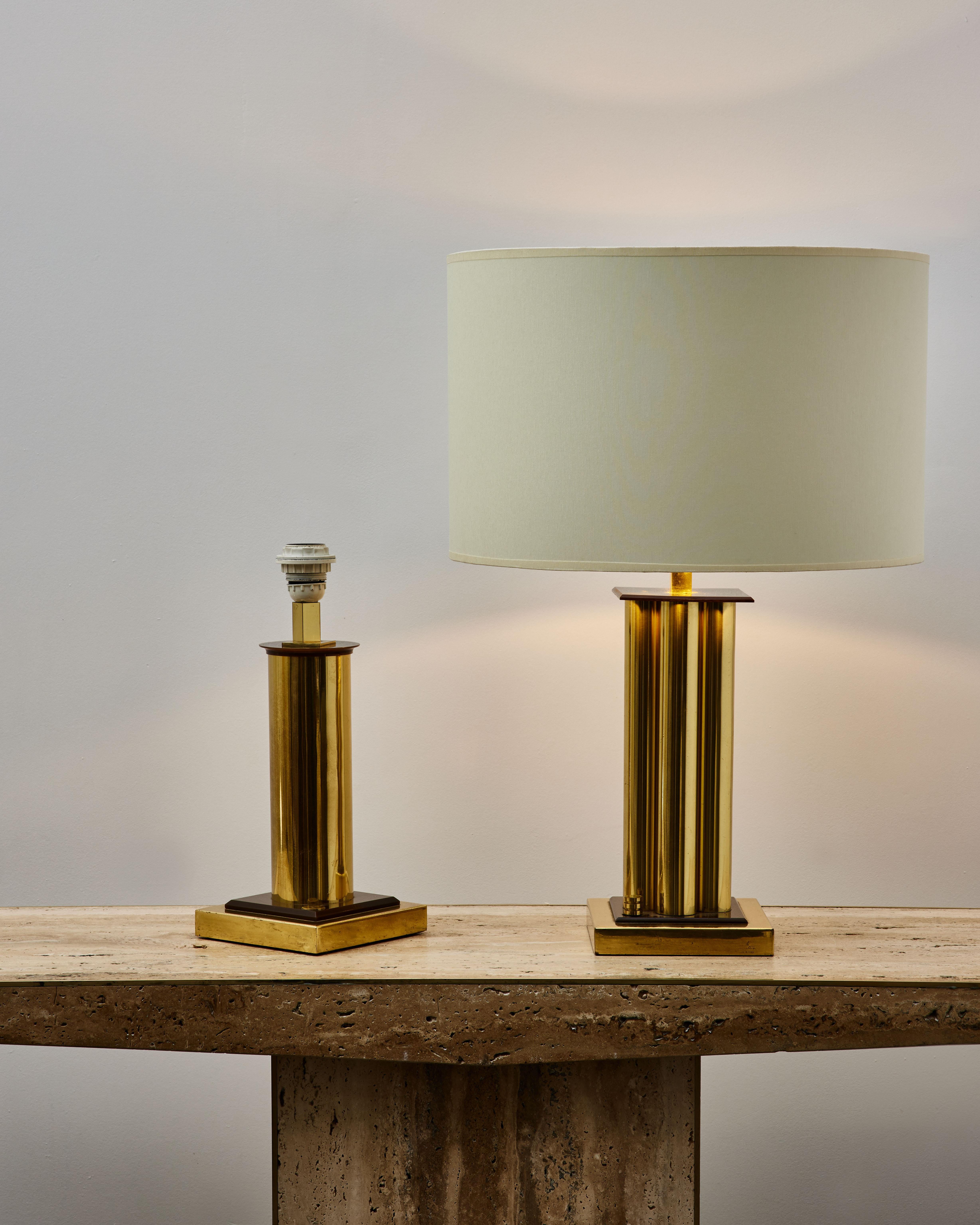 Rare pair of table lamps in brass, signed by the artist Romeo Rega.
Rewired. Italy, 1970s.

Price and dimensions without shades.