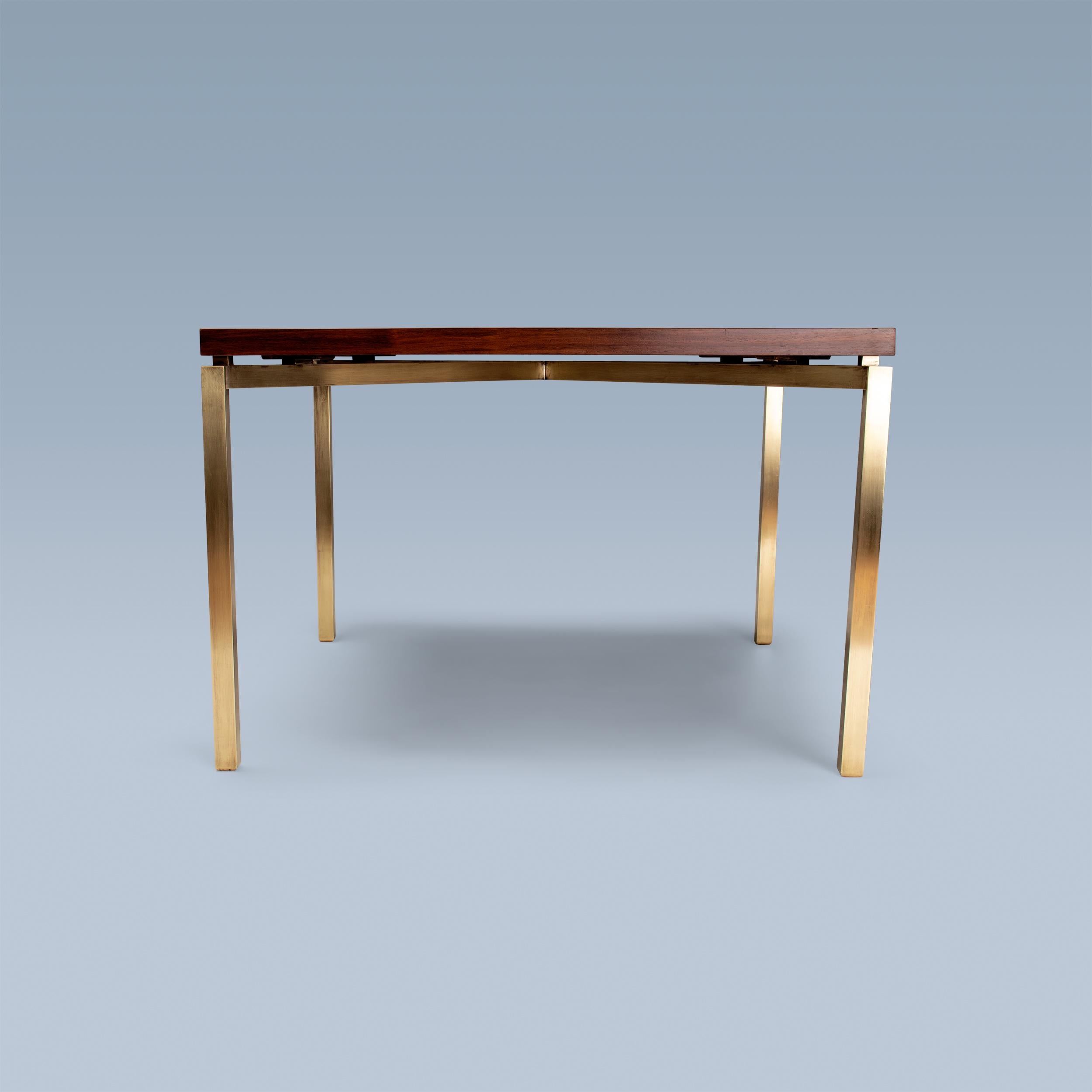 This square table by Danish multi-artist Bjørn Wiinblad (1918-2006) has a total of no less than 196 handpainted tiles on top. The tabletop frame is made from wenge and the legs are brass.

It was designed and executed in 1960 for luxury department