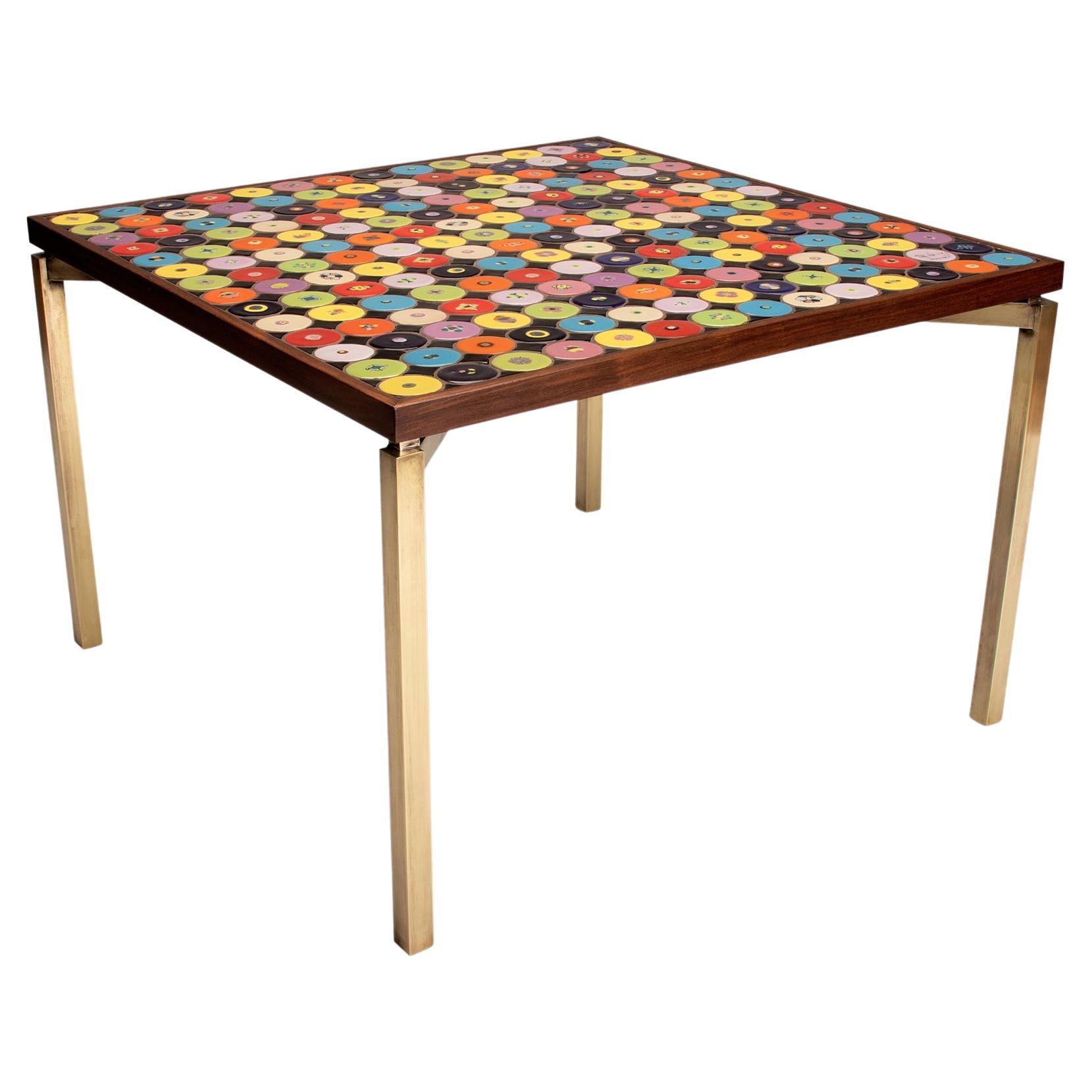 Danish modern coffee table with red, yellow, green, blue tiles and brass legs For Sale