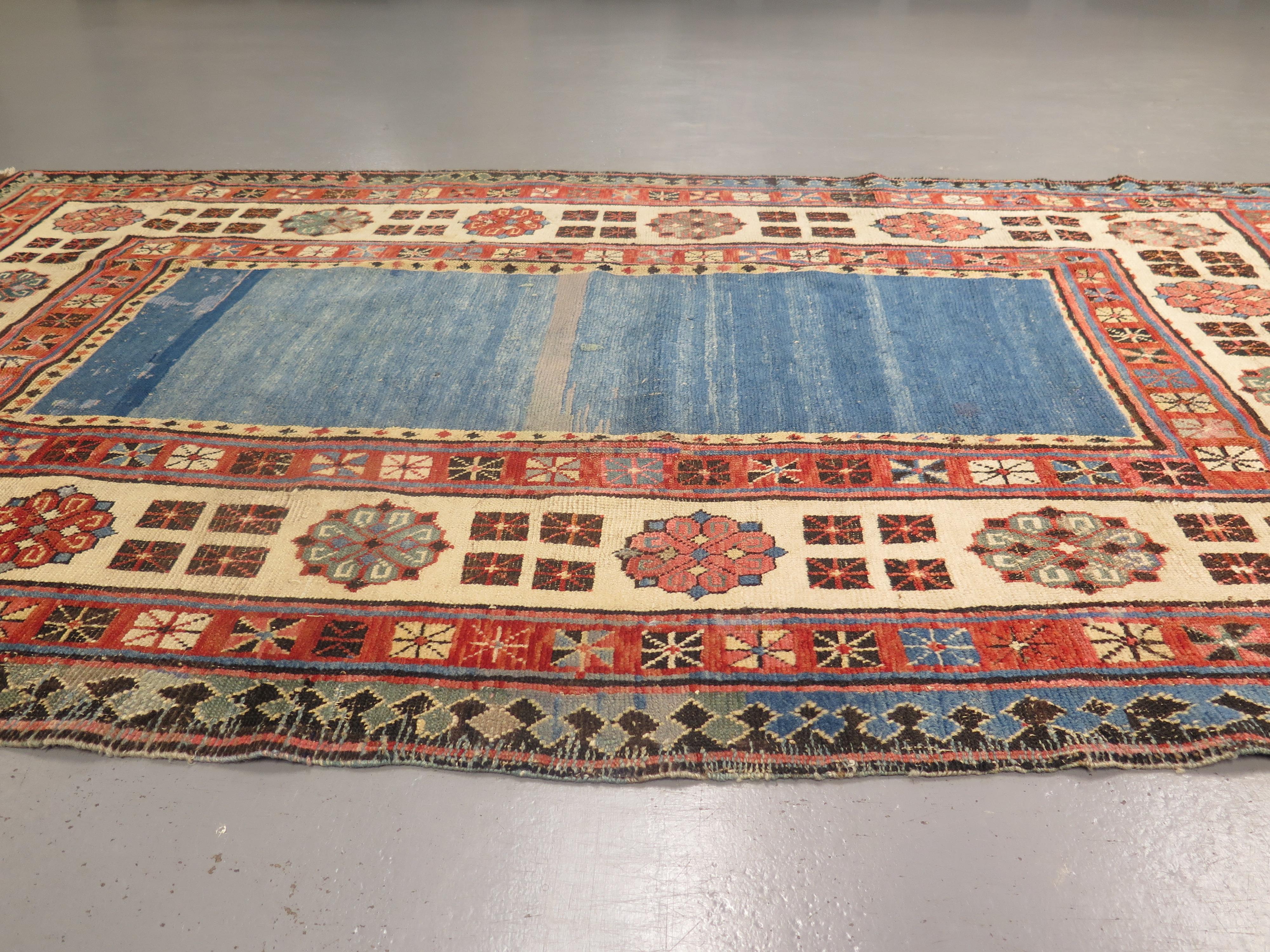 Antique Talish rugs, coming from one of the earliest inhabited regions of modern-day Azerbaijan, are well-known for their unique drawing and high-quality wool, as well as for a tendency to employ floral motifs, rather than the geometric designs that