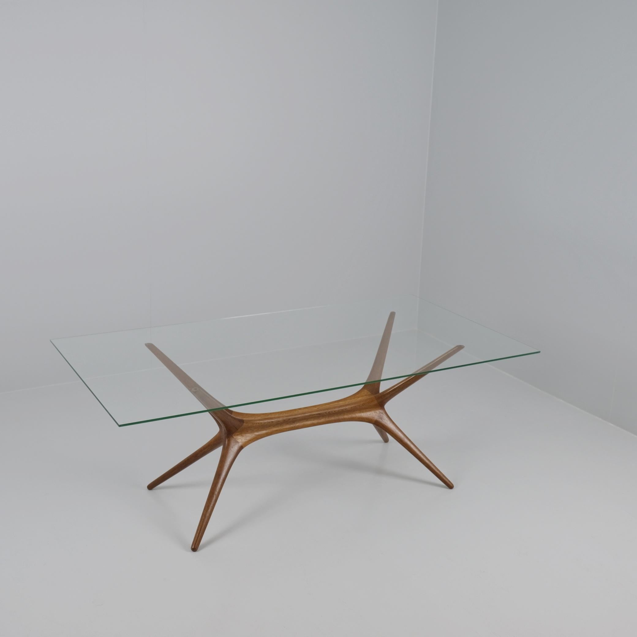 An exceedingly rare Tapio Wirkkala coffee table model 9020 aka Reindeer Antlers due inspiration behind the design taken from Reindeers native to Lapland where Tapio Wirkkala spent much of his time designing in solitude. The elm frame is toped with a