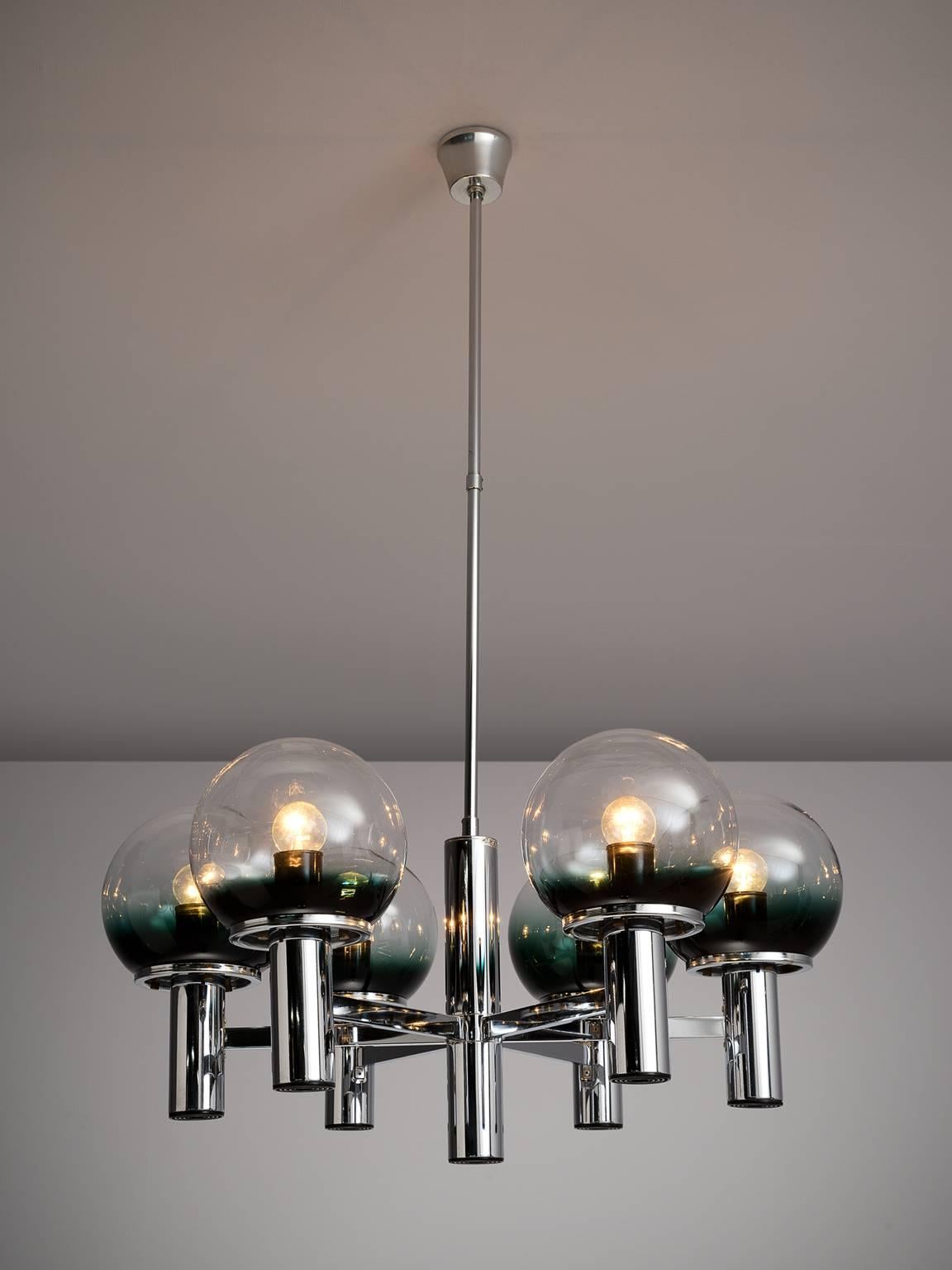 Targetti Sankey, chandelier, chromed metal, clear Murano glass, Italy, 1970s.

This upwards facing chandelier is designed by Targetti Sankey in the 1970s. The chandelier has beautiful Murano glass globes of which the bottom features a deep dark