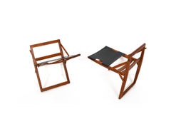 Raros reposapiés de teca de Peter Hvidt & Orla Mølgaard-Nielsen