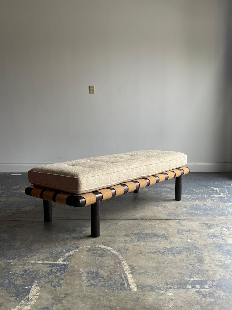 A truly rare bench designed by T.H. Robsjohn-Gibbings for Widdicomb. This is one of the more iconic series that he designed and the Greek influence is strong and welcomed. A very organic piece with the use of wide cotton strapping and rounded wood