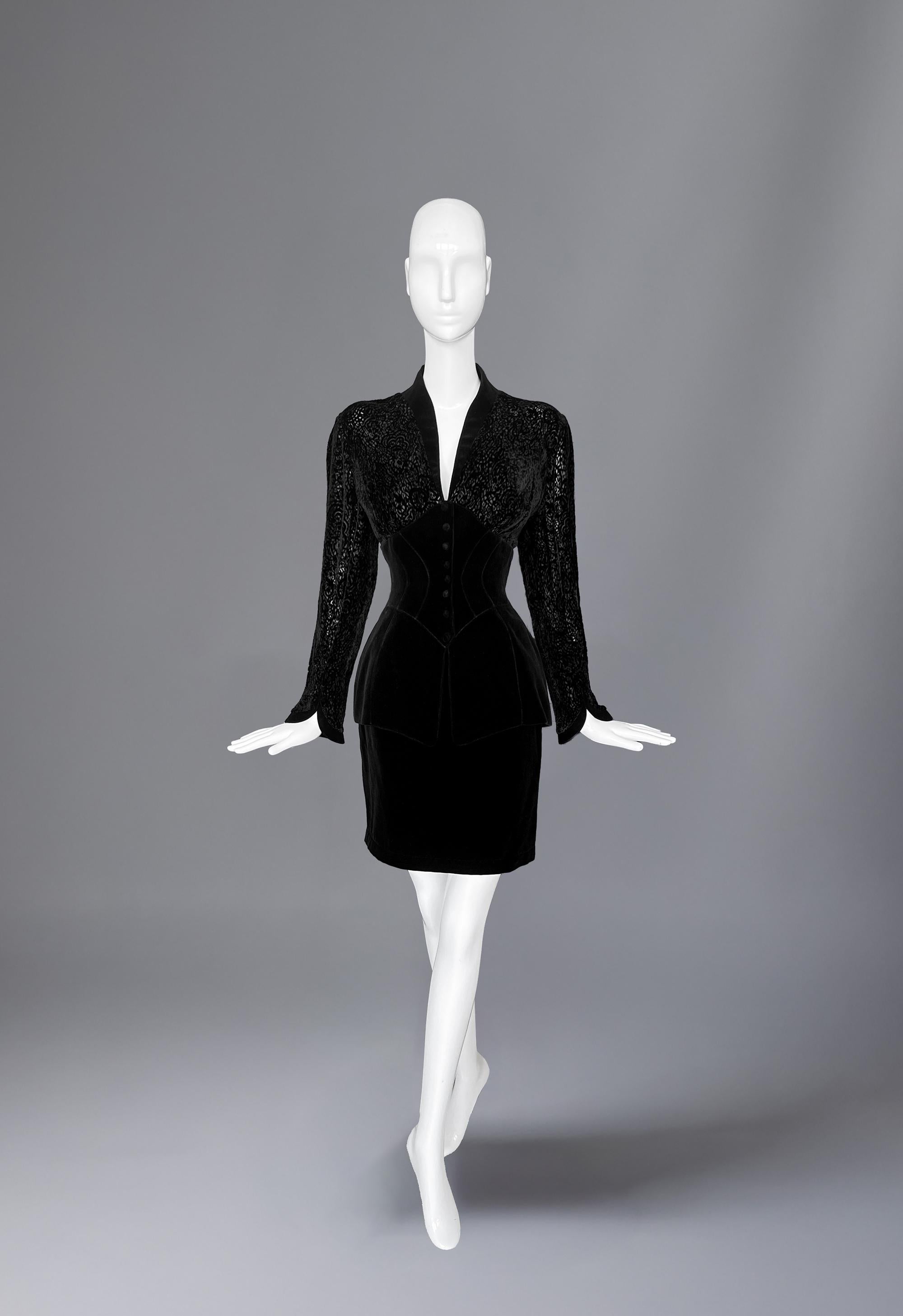 Gorgeous extremely rare Thierry Mugler ensemble. The silhouette is pure Mugler: a masterclass in the power of tailoring. Cut close to the body, the jacket cinches into fitted waist with a nipped, corset-inspired structure that exaggerates the hips