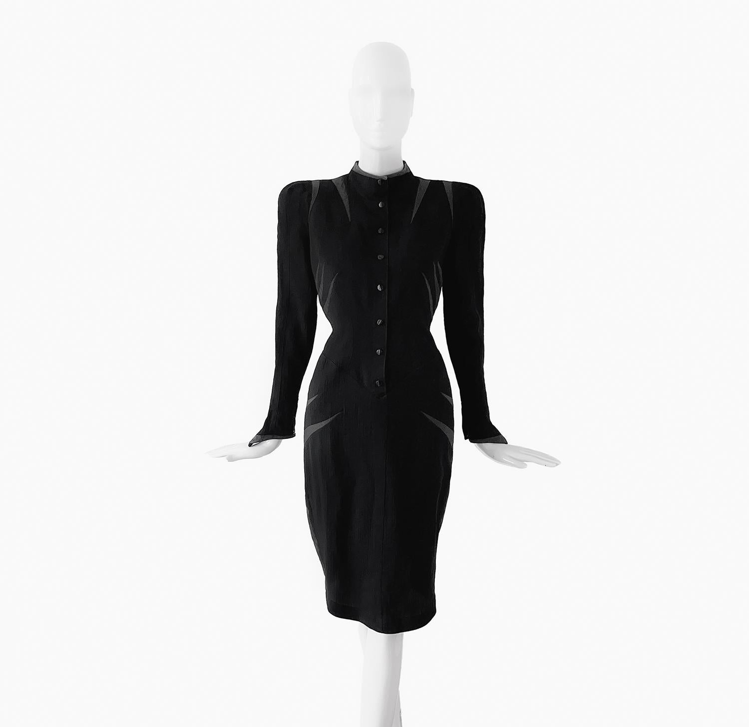 
Gorgeous extremely rare Thierry Mugler dress, Spring Summer 1988 Collection. Dramatic schulptural femme fatale dress with strong shoulders, high neck and Silk stripe details. A very rare creation of Thierry Mugler's early Collections, typical