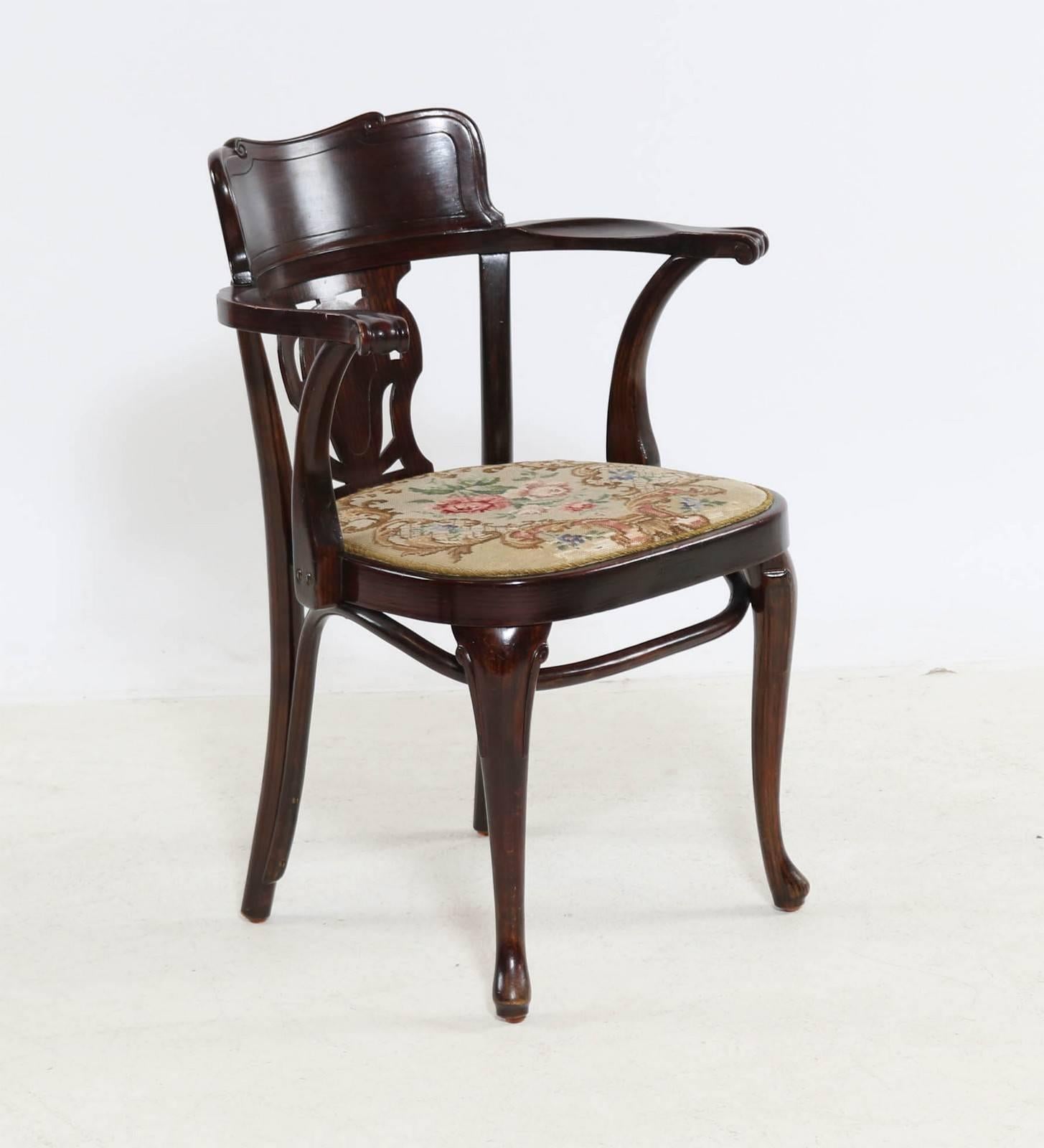 Beech bentwood dark brown stained with an upholstered seat from the late 1930s.