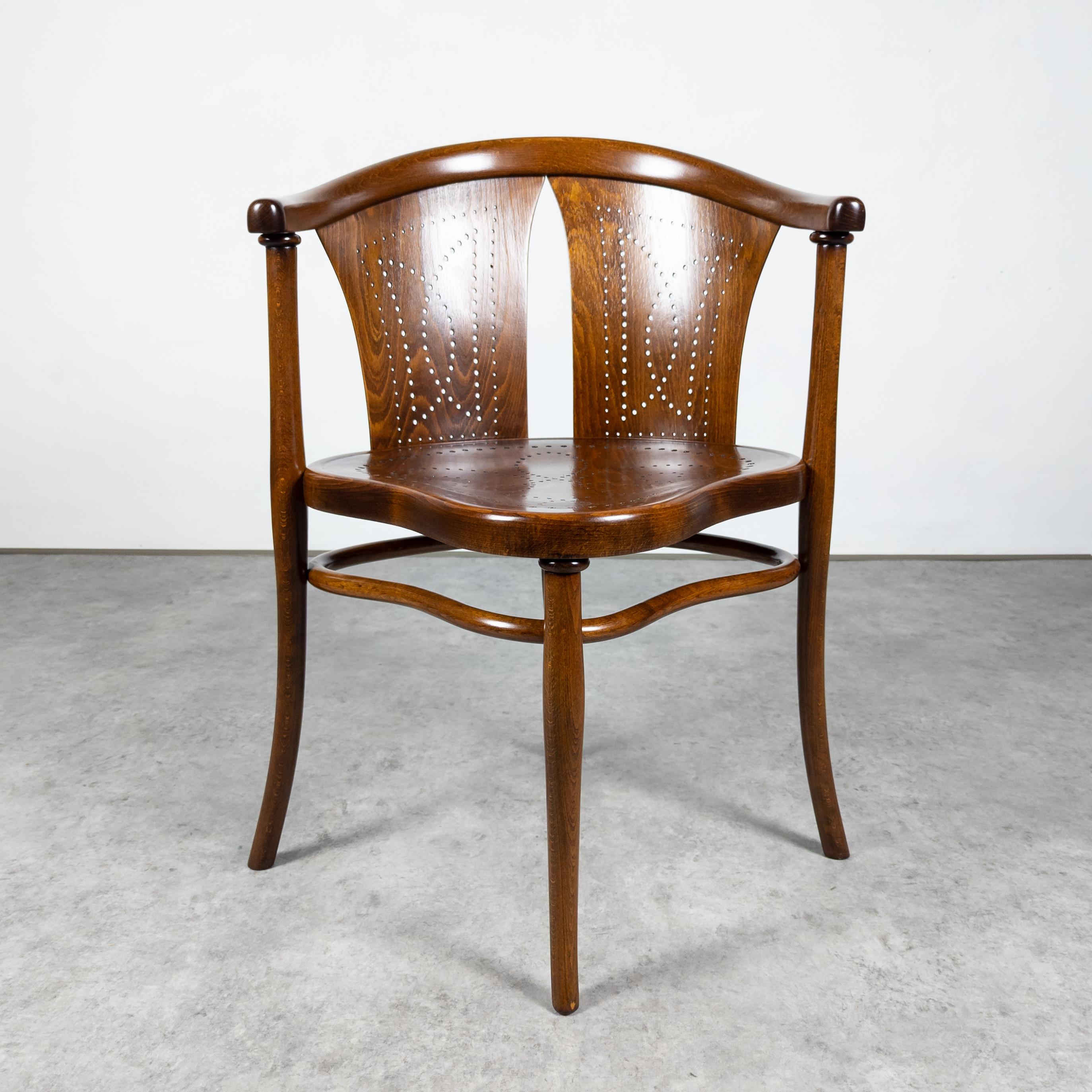 Rare model featured in 1904 Thonet catalogue. Bent solid beech with perforated plywood seat and back. Labeled and imprinted with Thonet factory trade mark. Expertly restored by a professional studio with long history of preserving rare and unique