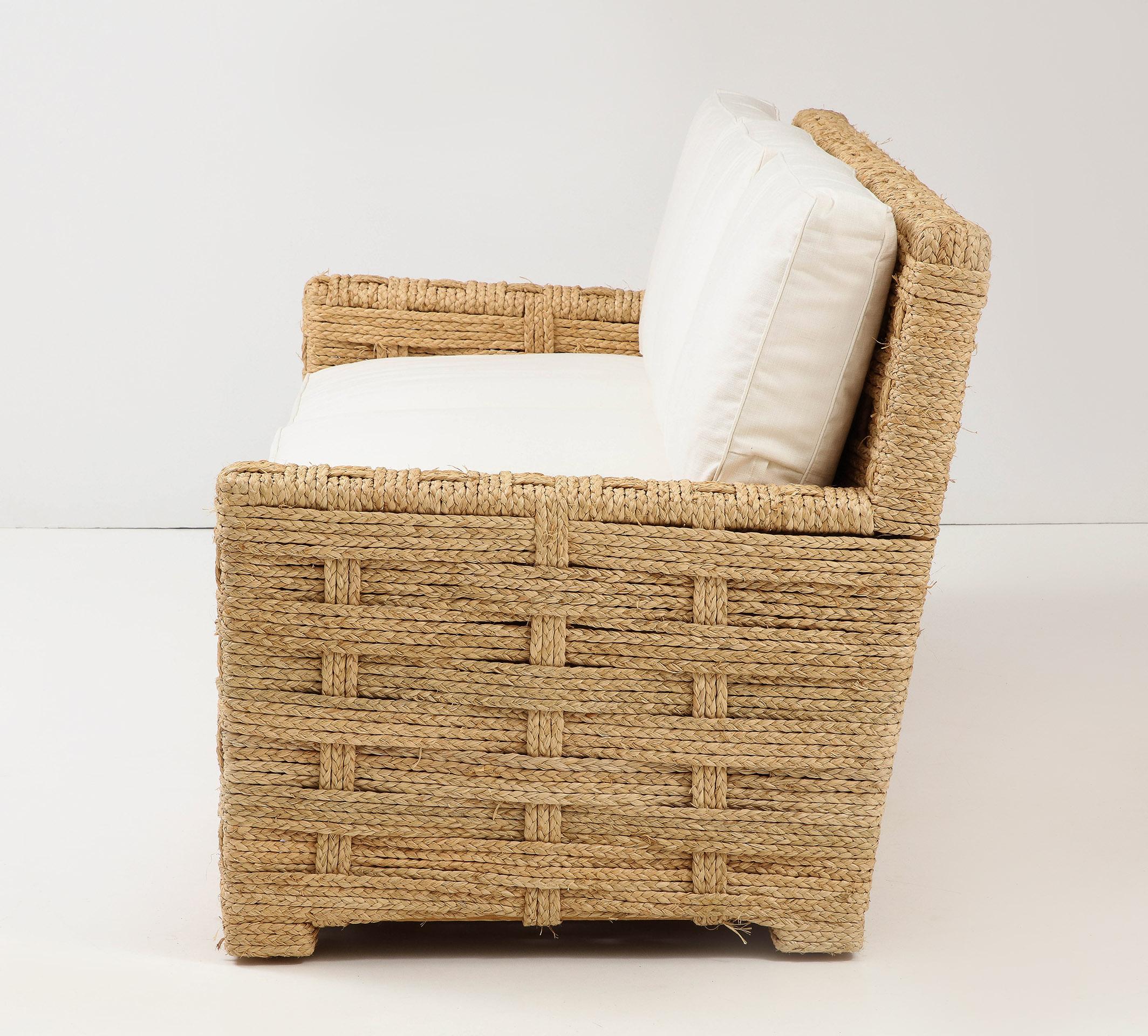In very fine original condition, the whole is wrapped in braided raffia over an oak frame.
- Seat H. 17.32