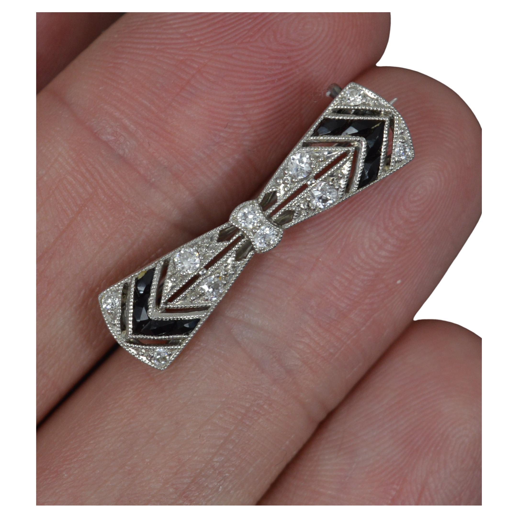 Rare TIFFANY and CO Art Deco Platinum Diamond and Onyx Bow Brooch For Sale