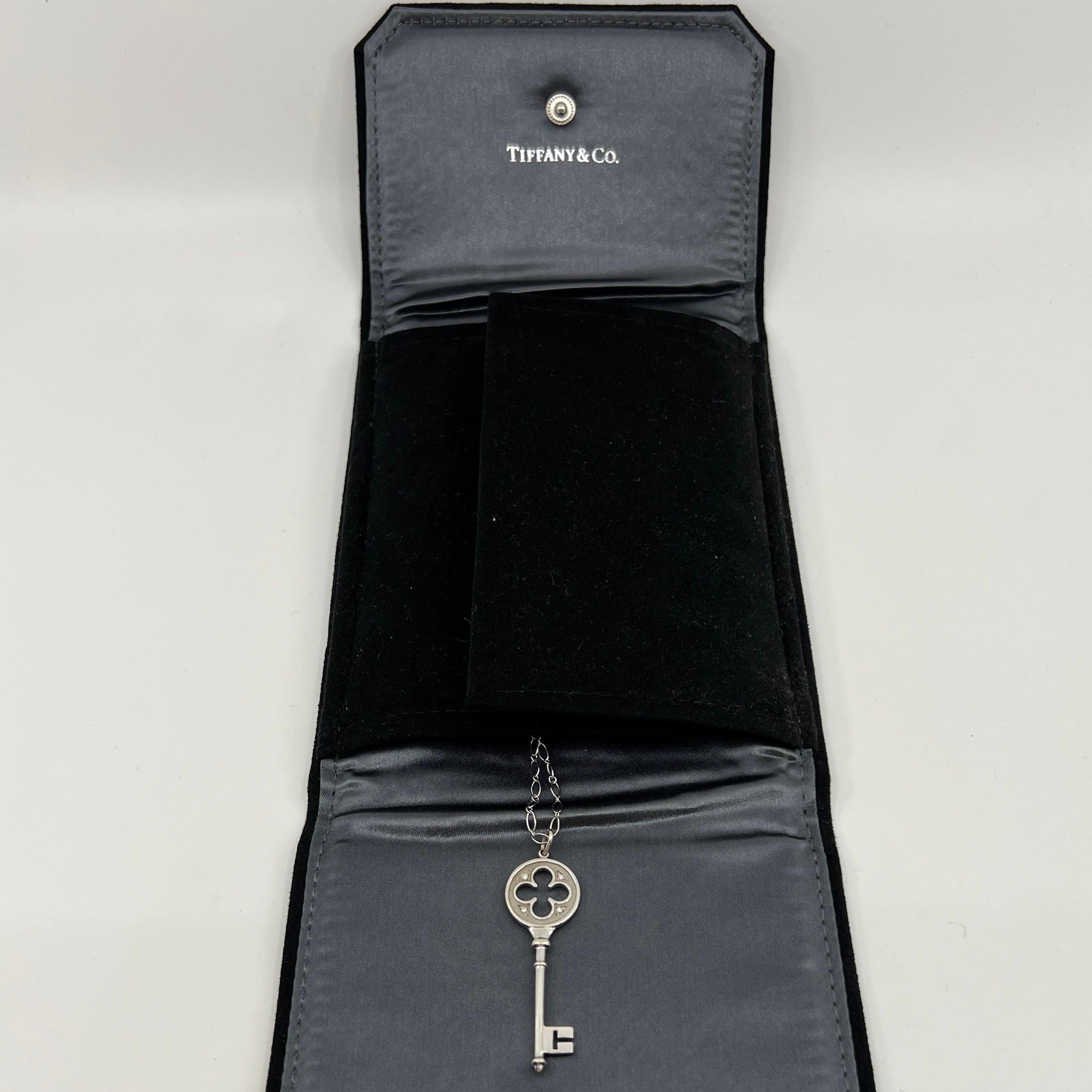Women's Rare Tiffany & Co. Diamond 4 Leaf Clover 18k White Gold Key Pendant Necklace For Sale