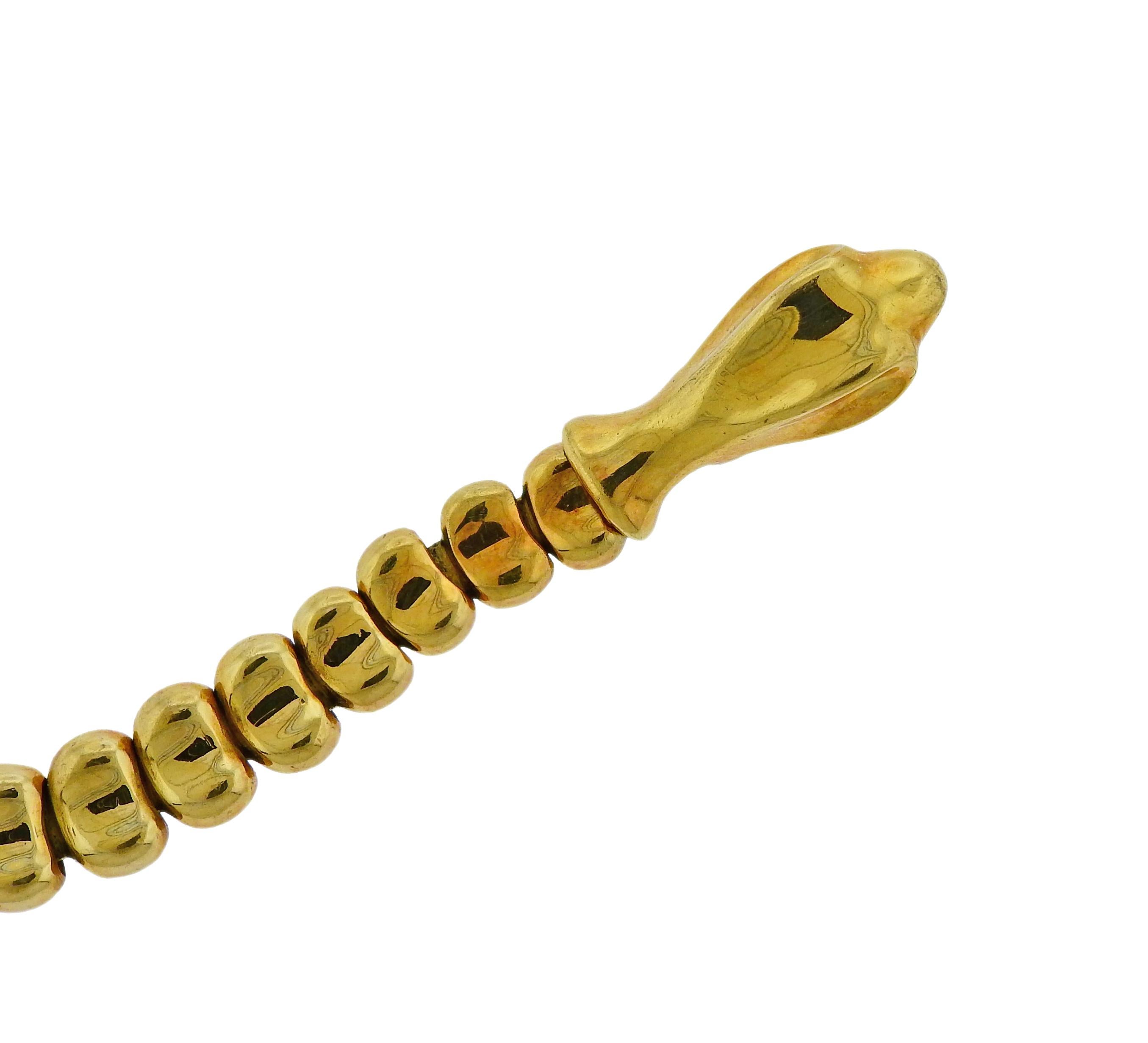 Rare 18k yellow gold snake bracelet by Elsa Peretti, crafted for Tiffany & Co. Bracelet is 8 5/8