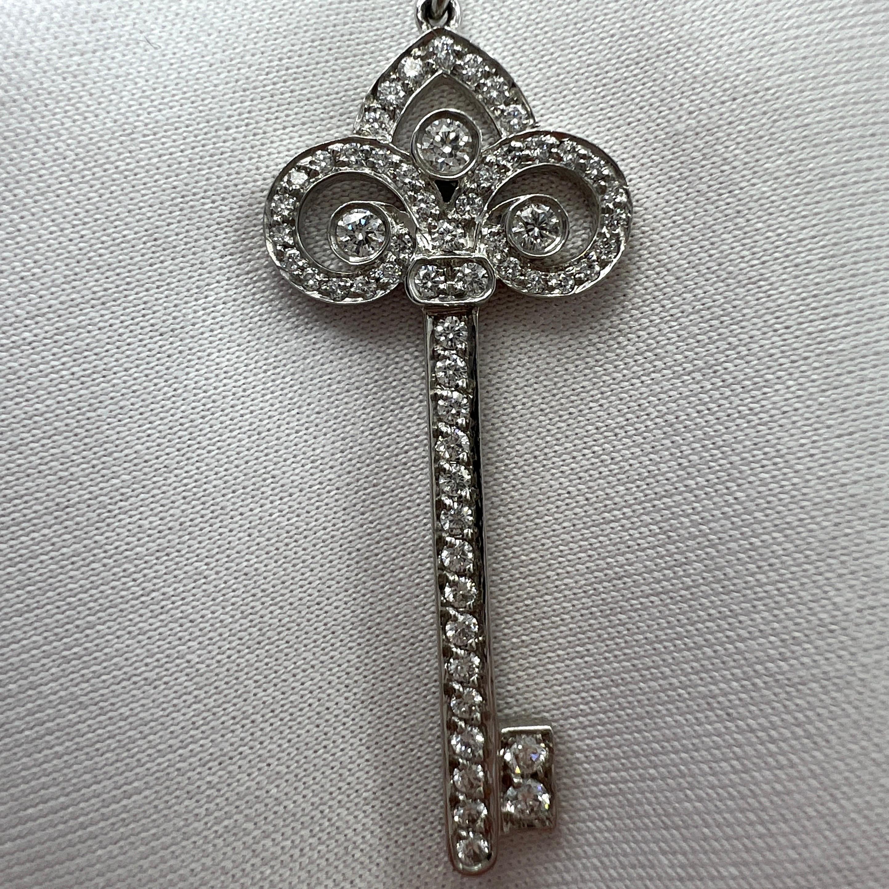 Round Cut Rare Tiffany & Co. Fleur de Lis Diamond Platinum Key Pendant Necklace For Sale