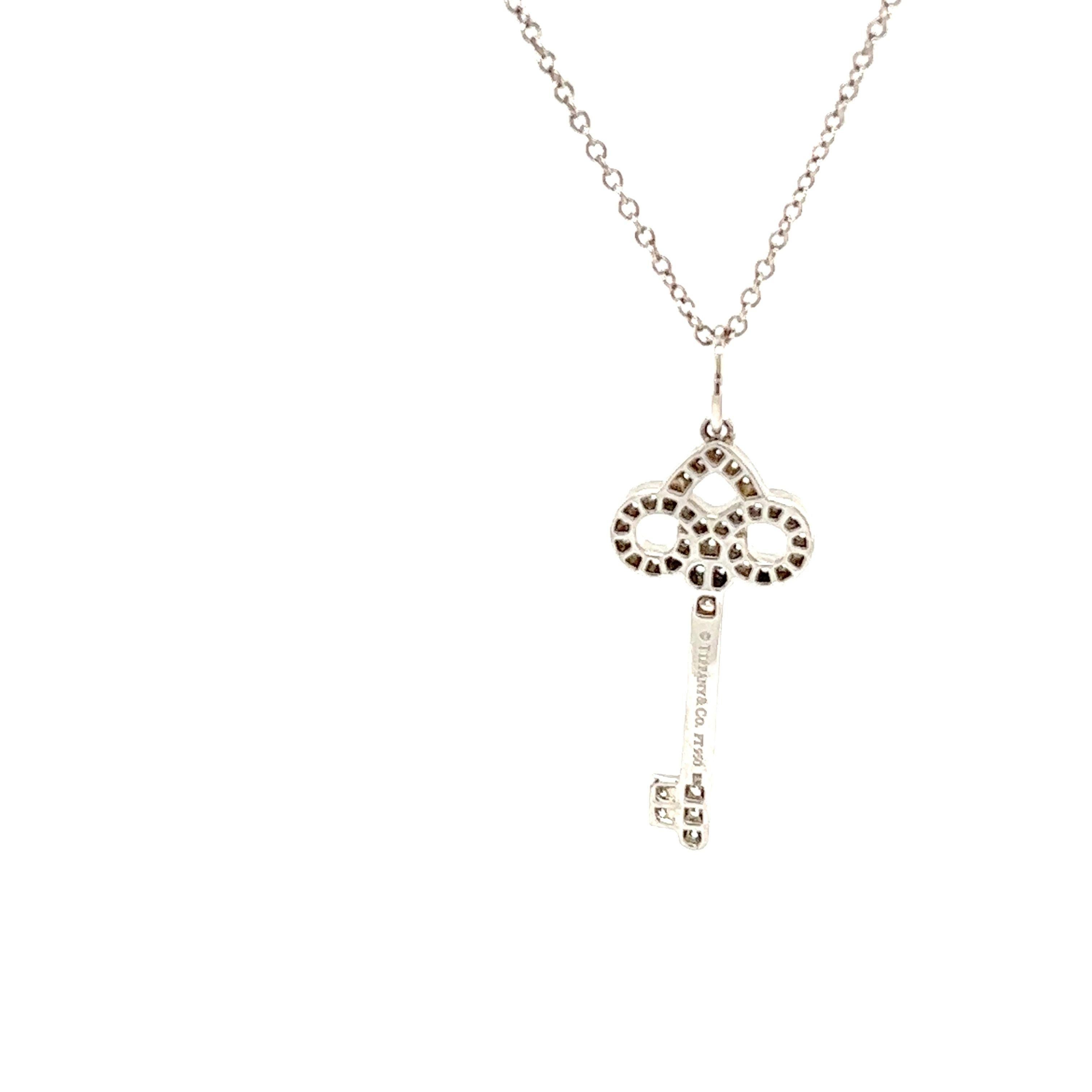 Women's Rare Tiffany & Co. Fleur de Lis Diamond Platinum Key Pendant Necklace For Sale