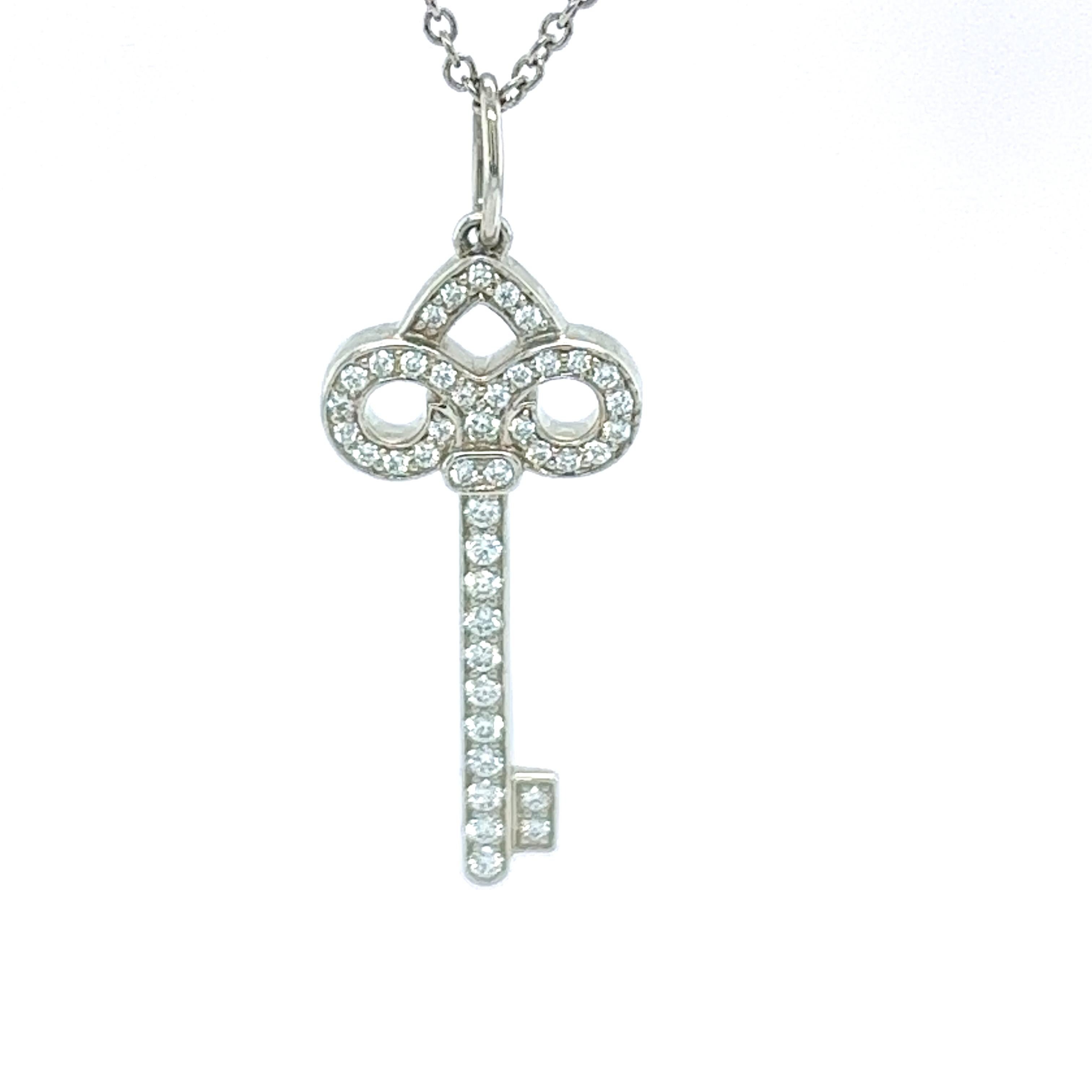 Rare Tiffany & Co. Fleur de Lis Diamond Platinum Key Pendant Necklace For Sale 3