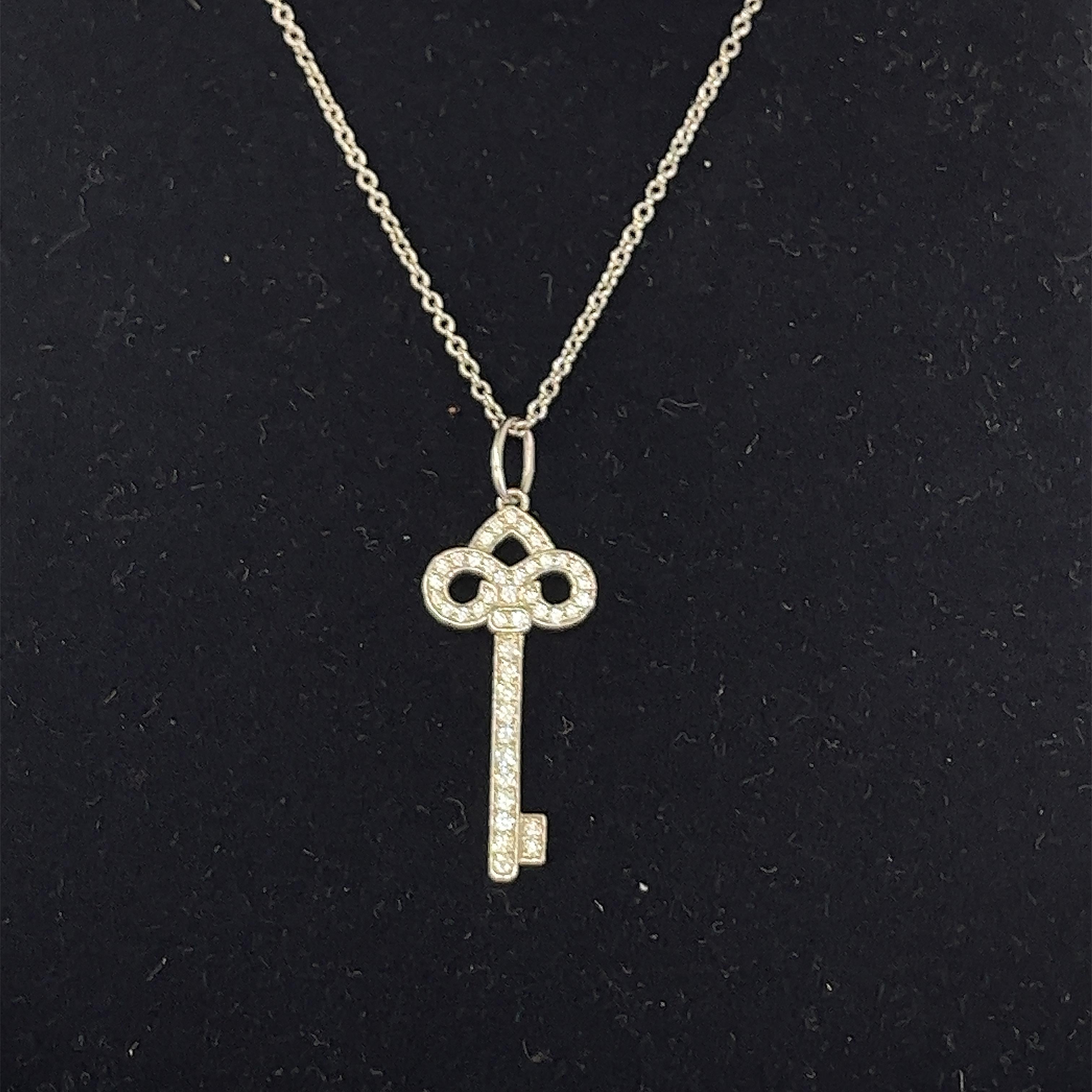 Rare Tiffany & Co. Fleur de Lis Diamond Platinum Key Pendant Necklace For Sale 4