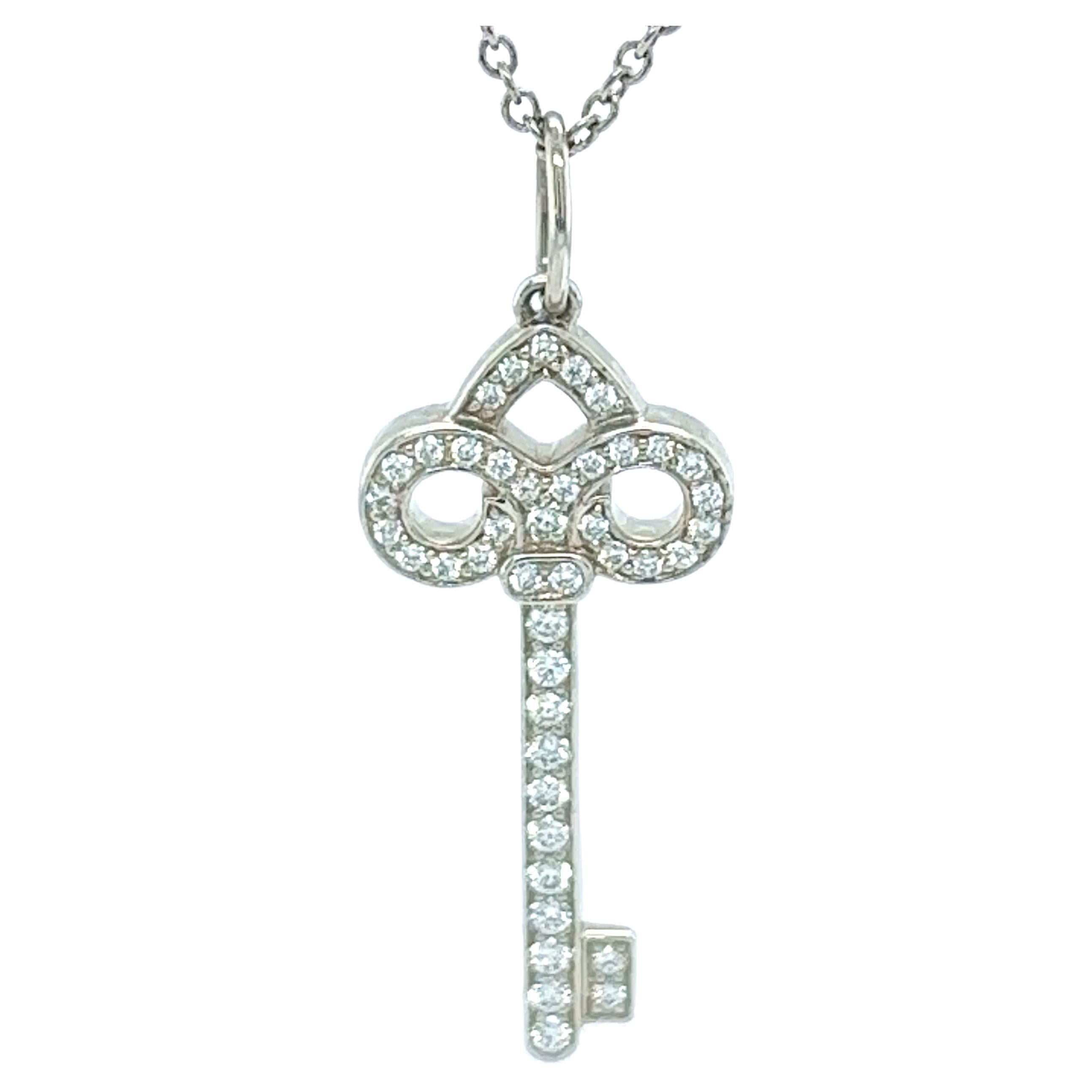 Rare Tiffany & Co. Fleur de Lis Diamond Platinum Key Pendant Necklace
