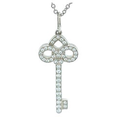 Rare Tiffany & Co. Fleur de Lis Diamond Platinum Key Pendant Necklace