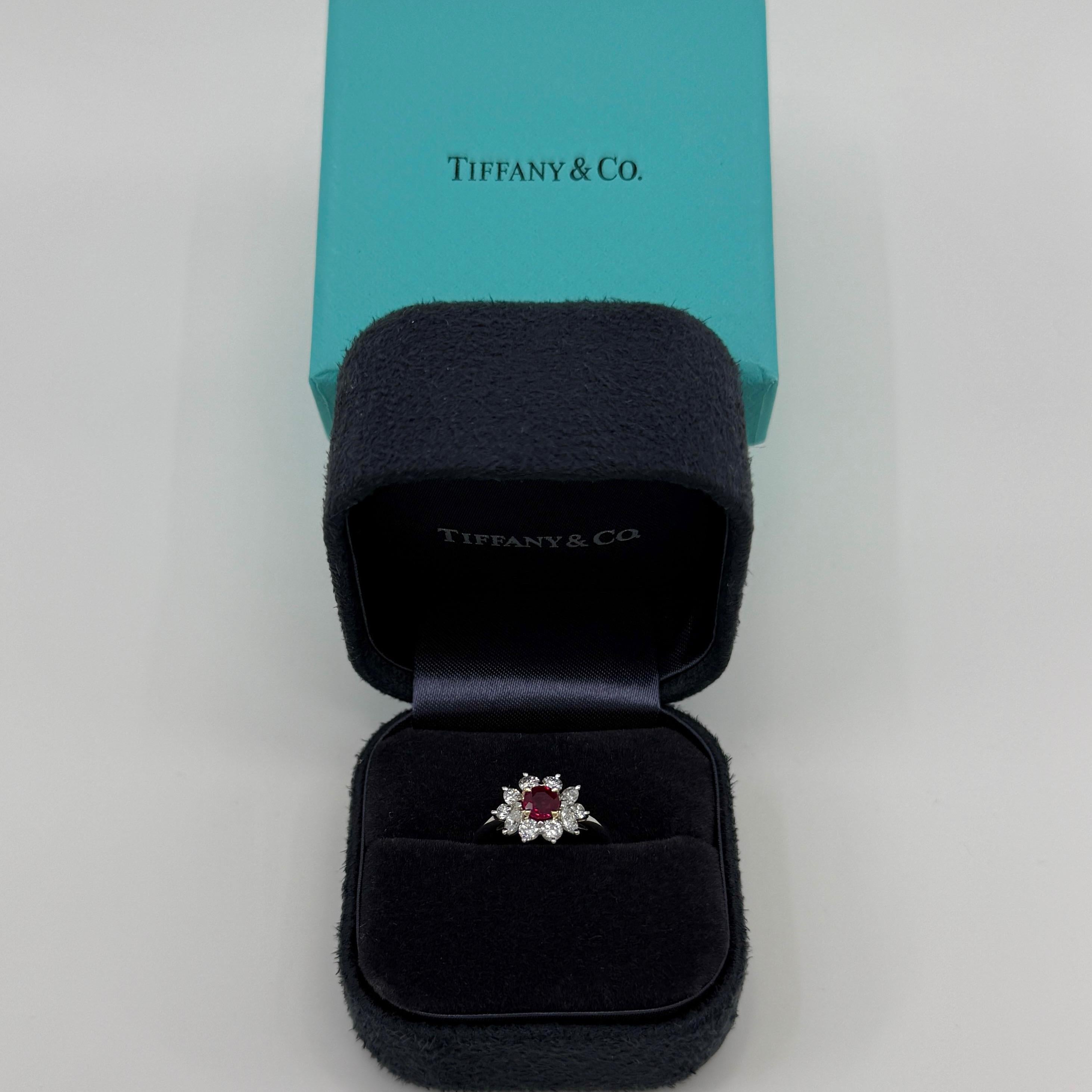 Rare Vintage Tiffany & Co. Ruby & Diamond 950 Platinum & 18k Yellow Gold Flower Ring.

A very rare piece, these rarely make it to market. We also have the matching necklace listed for sale.
The only other model of these currently for sale is another